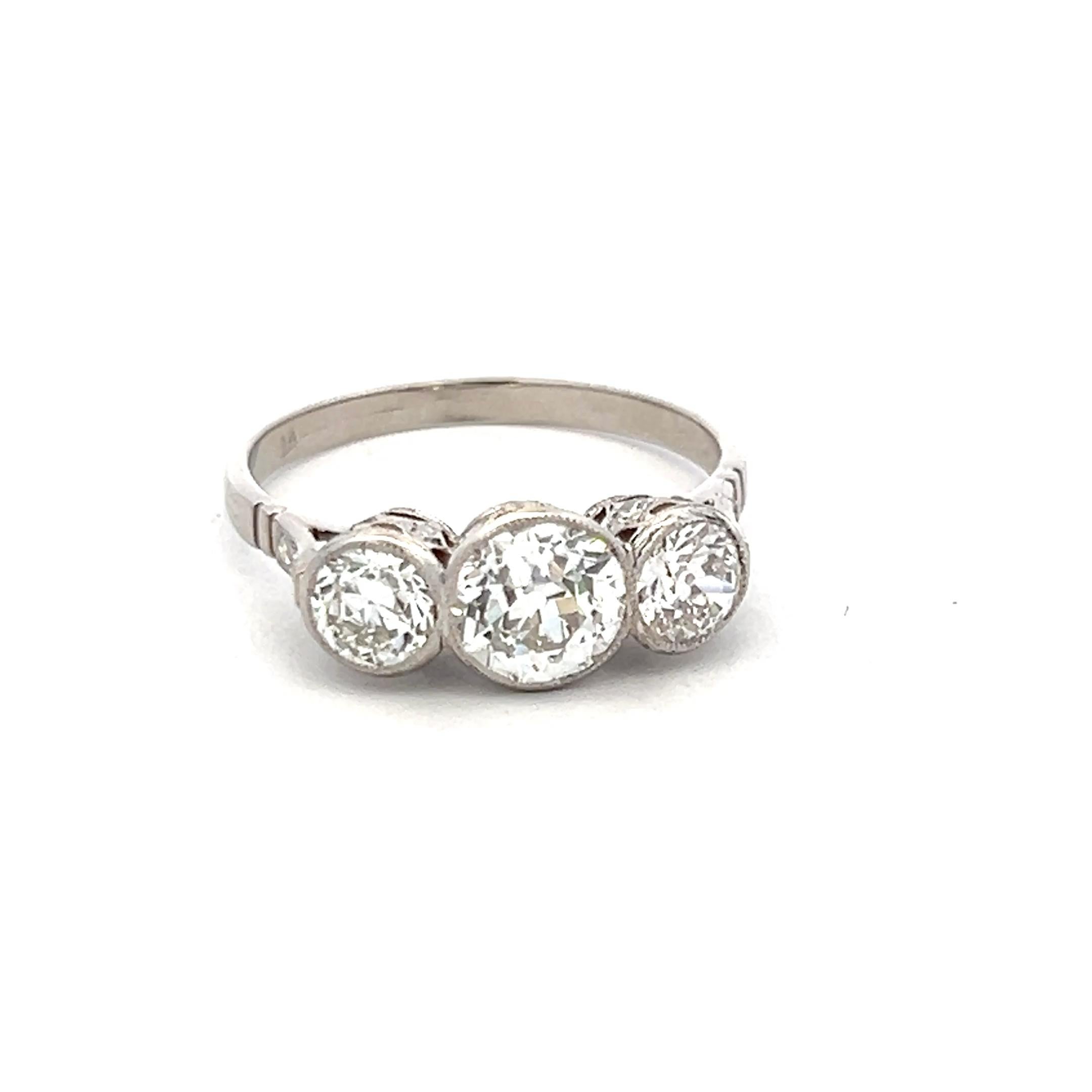 Women's 1.78 Carat Old European Cut I VS1 Diamond Platinum Three-Stone Ring For Sale