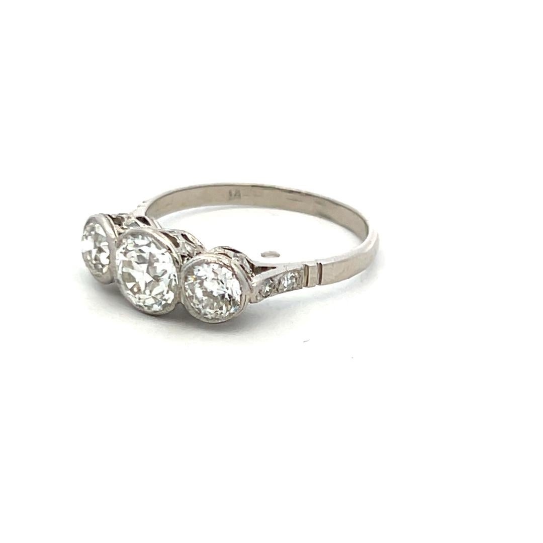 1.78 Carat Old European Cut I VS1 Diamond Platinum Three-Stone Ring For Sale 2