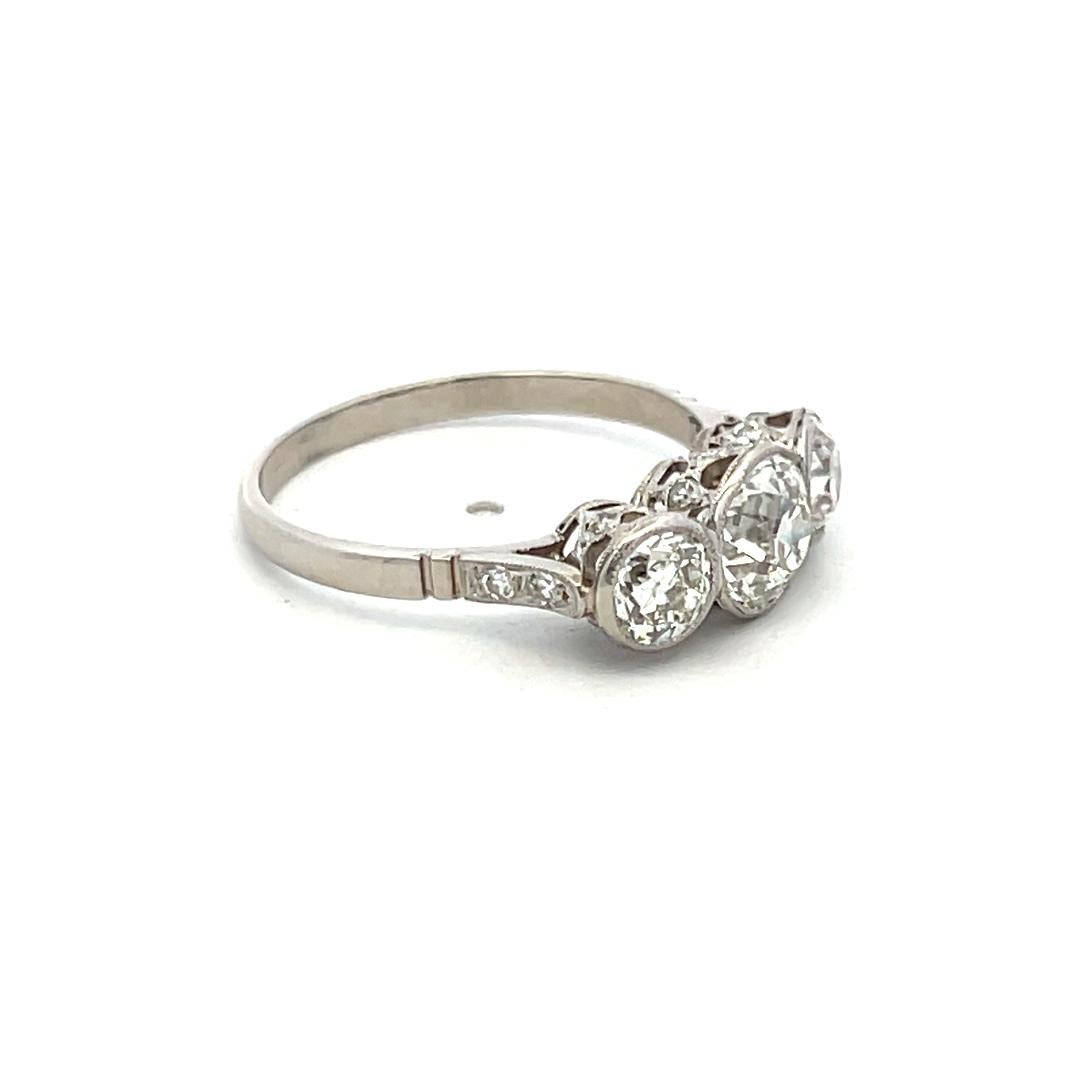 1.78 Carat Old European Cut I VS1 Diamond Platinum Three-Stone Ring For Sale 3