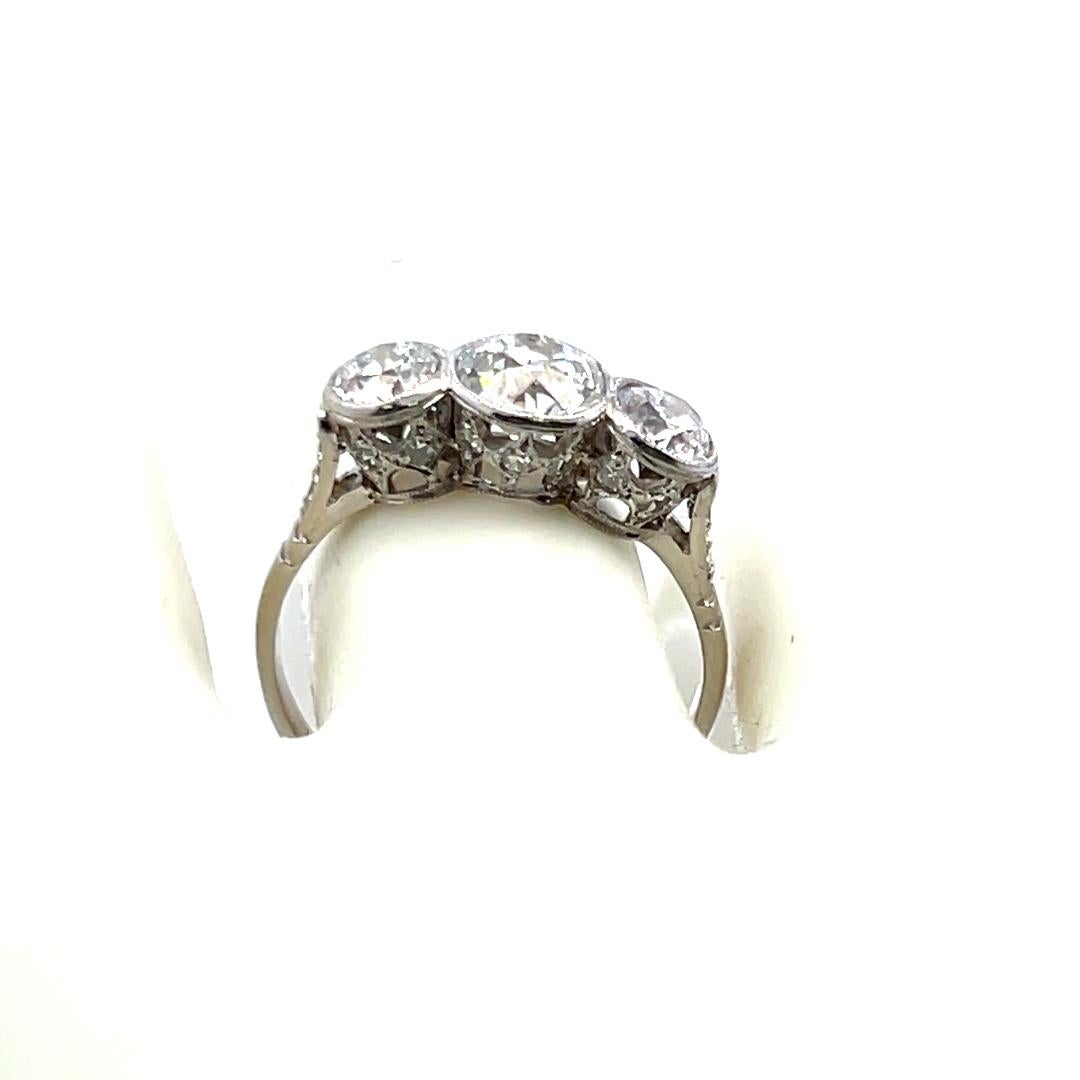 1.78 Carat Old European Cut I VS1 Diamond Platinum Three-Stone Ring For Sale 4