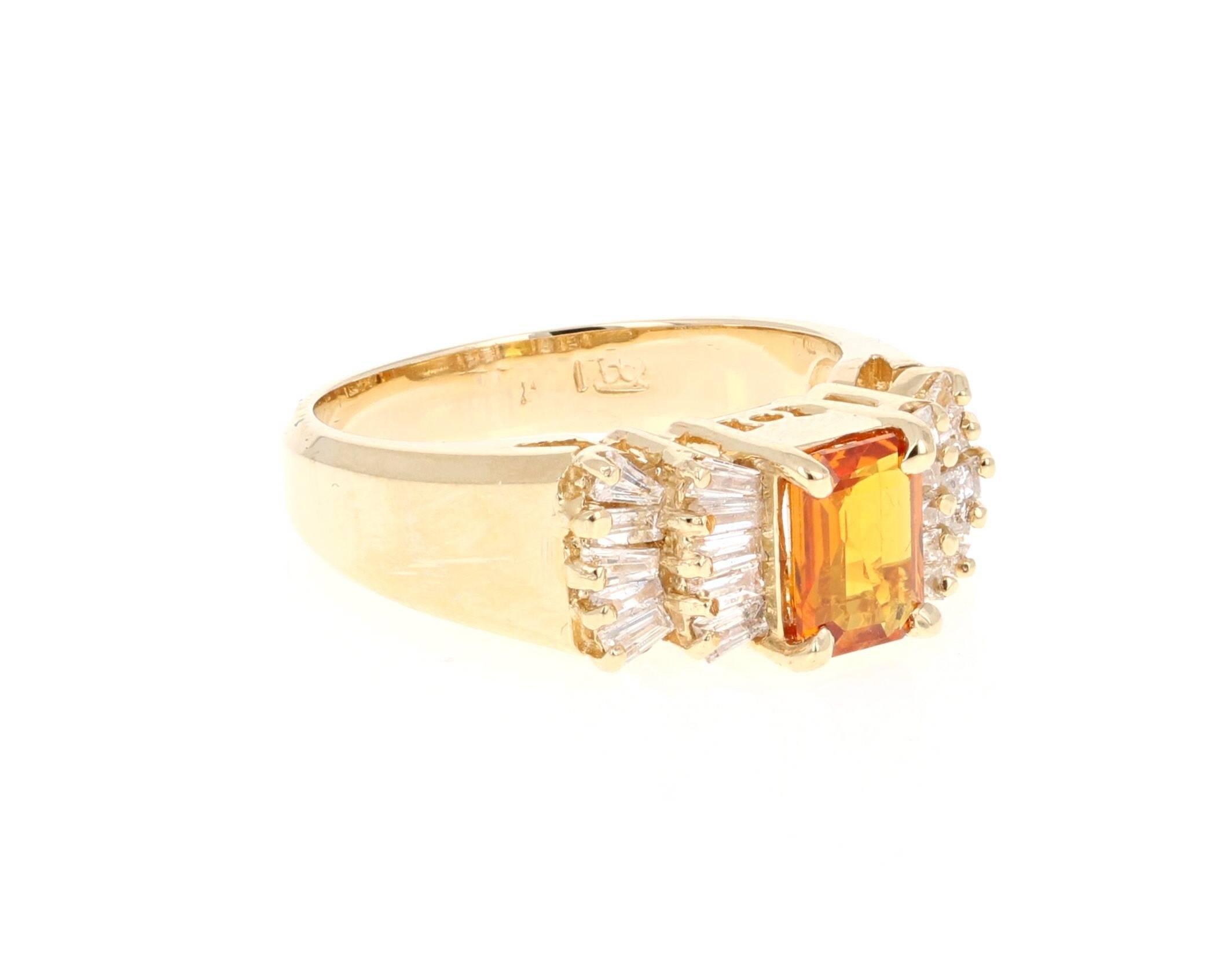 A gorgeous Orange Sapphire and Diamond Ring set in Yellow Gold. It can be the most beautiful and unique Engagement Ring. 
The Emerald Cut Orange Sapphire is 1.22 carats and is surrounded by 20 Baguette Cut Diamonds weighing 0.56 Carats. The total