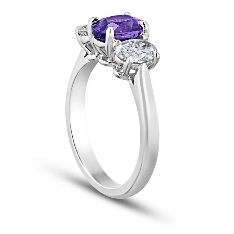 1.78 carat Oval Purple Sapphire set with two oval diamonds weighing 1.00 carats (GIA -  F /VS) set in a platinum ring
