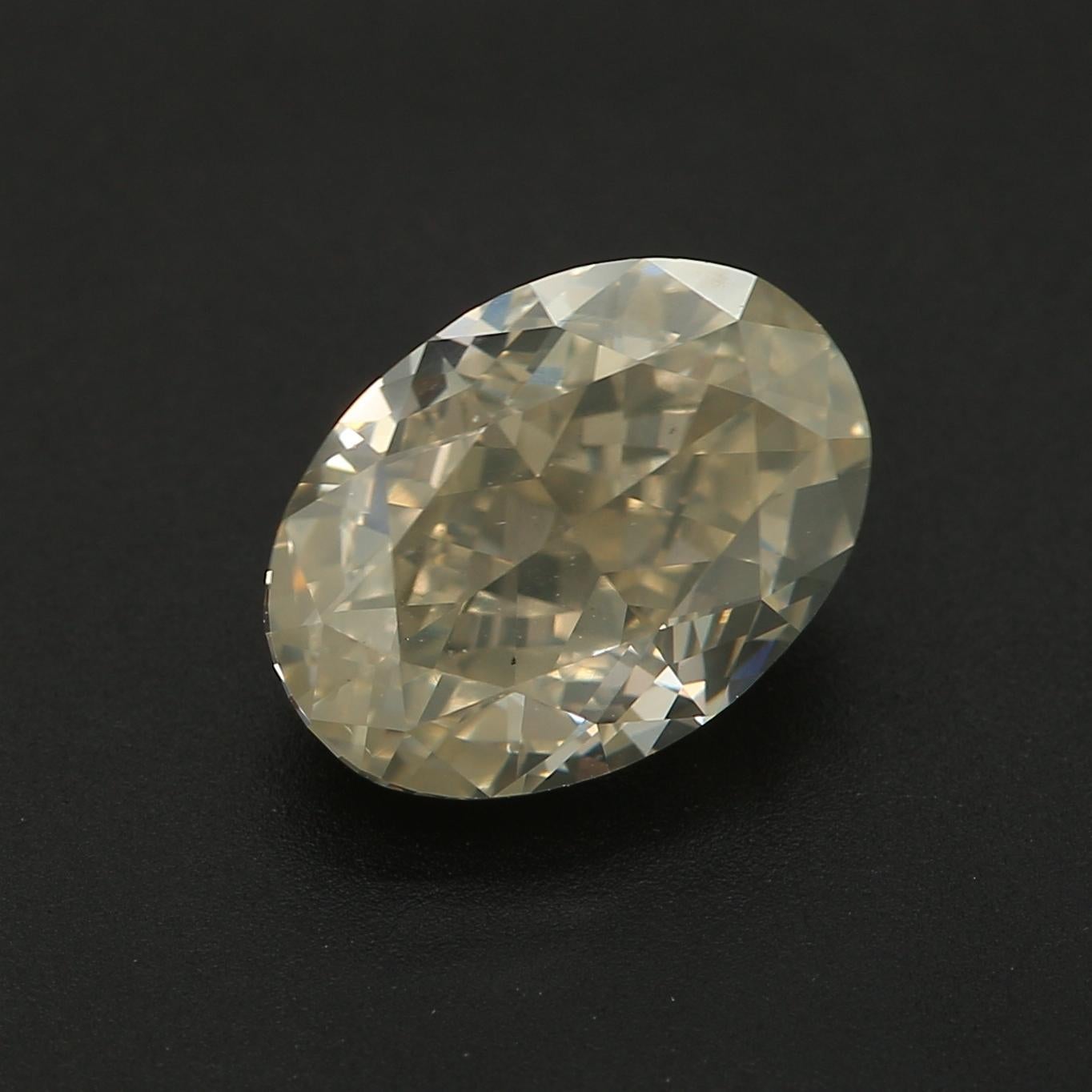 ***100% NATURAL FANCY COLOUR DIAMOND***

✪ Diamond Details ✪

➛ Shape: Oval
➛ Colour Grade: M
➛ Carat: 1.78
➛ Clarity: SI2
➛ IGI Certified 

^FEATURES OF THE DIAMOND^

This diamond weighs 1.78 carats, indicating its size and mass. It has a