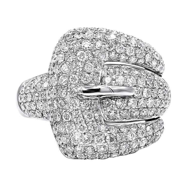 –Stunning Diamond Pave Buckle Ring Handcrafted in 18k white gold
– Contains 1.78 ct  Round Brilliant  Diamonds VS2 Clarity G-H color.
 -  The diamonds are handset in pave setting.
   - The ring is size 7
Ring sizing available for an additional fee.
