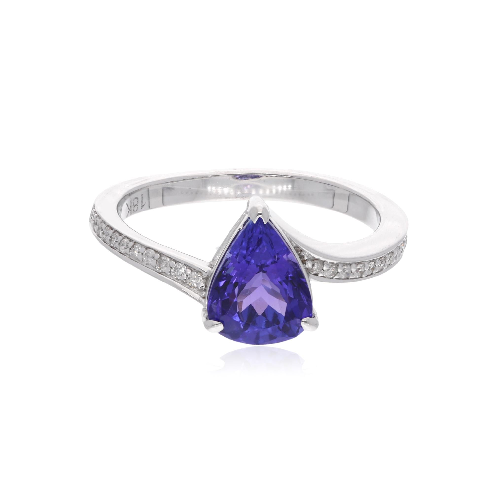 Modern 1.78 Carat Pear Shape Tanzanite Ring 0.10 Ct Pave Diamond 18 Karat White Gold For Sale