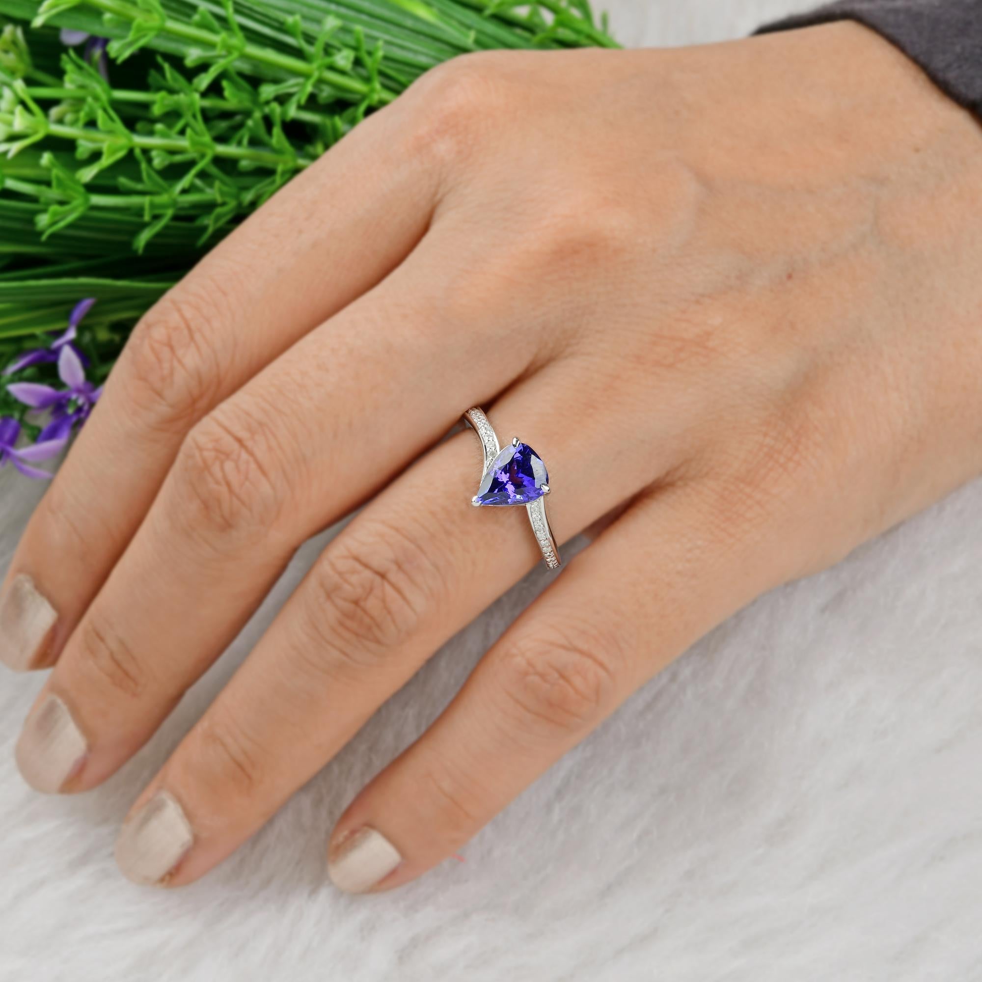 Women's 1.78 Carat Pear Shape Tanzanite Ring 0.10 Ct Pave Diamond 18 Karat White Gold For Sale