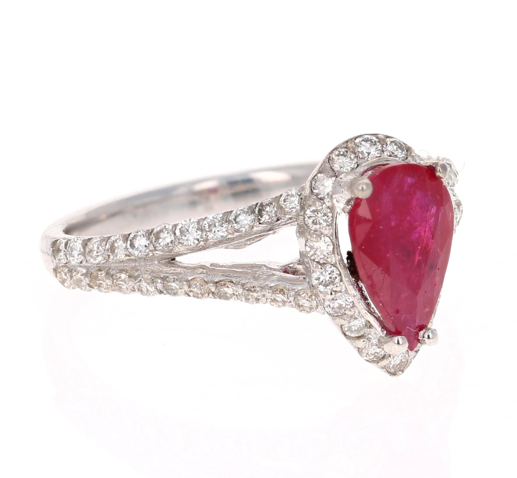 A simple yet beautiful ring with a 1.18 Carat Pear Cut Ruby as its center and 62 Round Cut Diamonds that weigh 0.60 carats. The total carat weight of the ring is 1.78 carats.

The ring is casted in 18K White Gold and weighs approximately 3.8 grams.