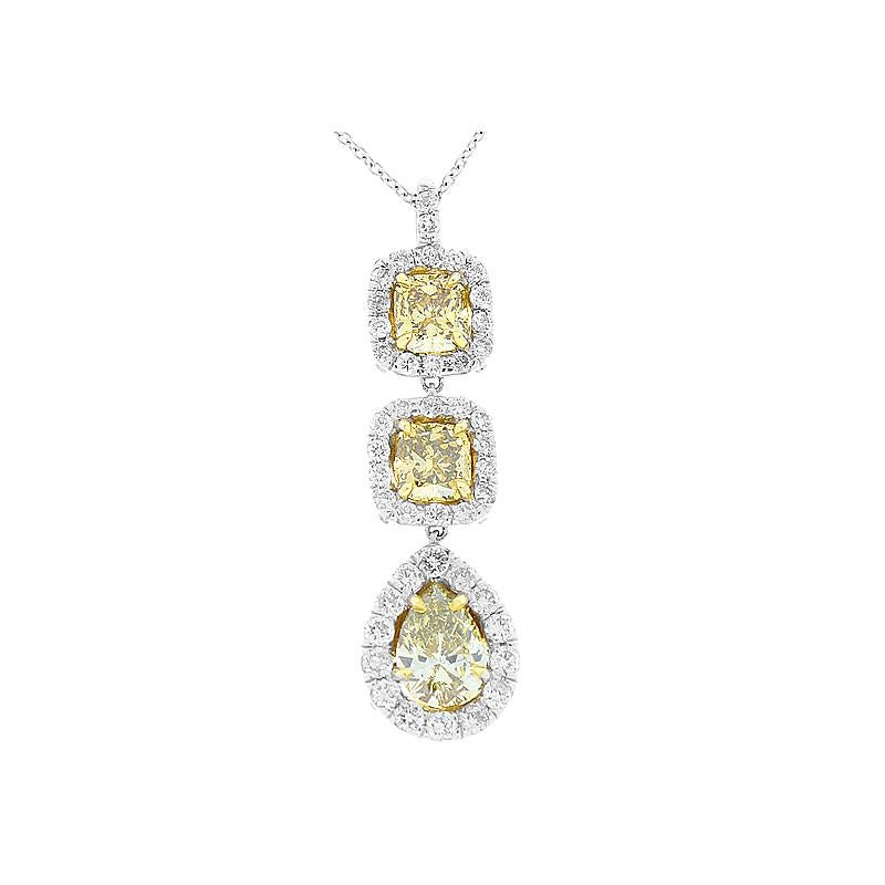 Diamant jaune fantaisie en or blanc de 1,78 carat au total, de taille coussin et en forme de poire