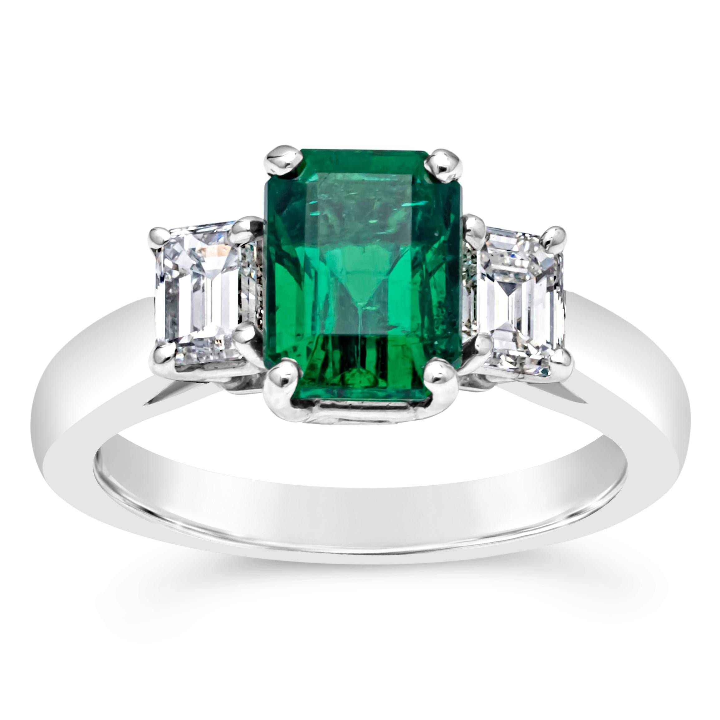 Contemporary 1.78 Carats Emerald Cut Green Emerald & Diamond Three Stone Engagement Ring For Sale