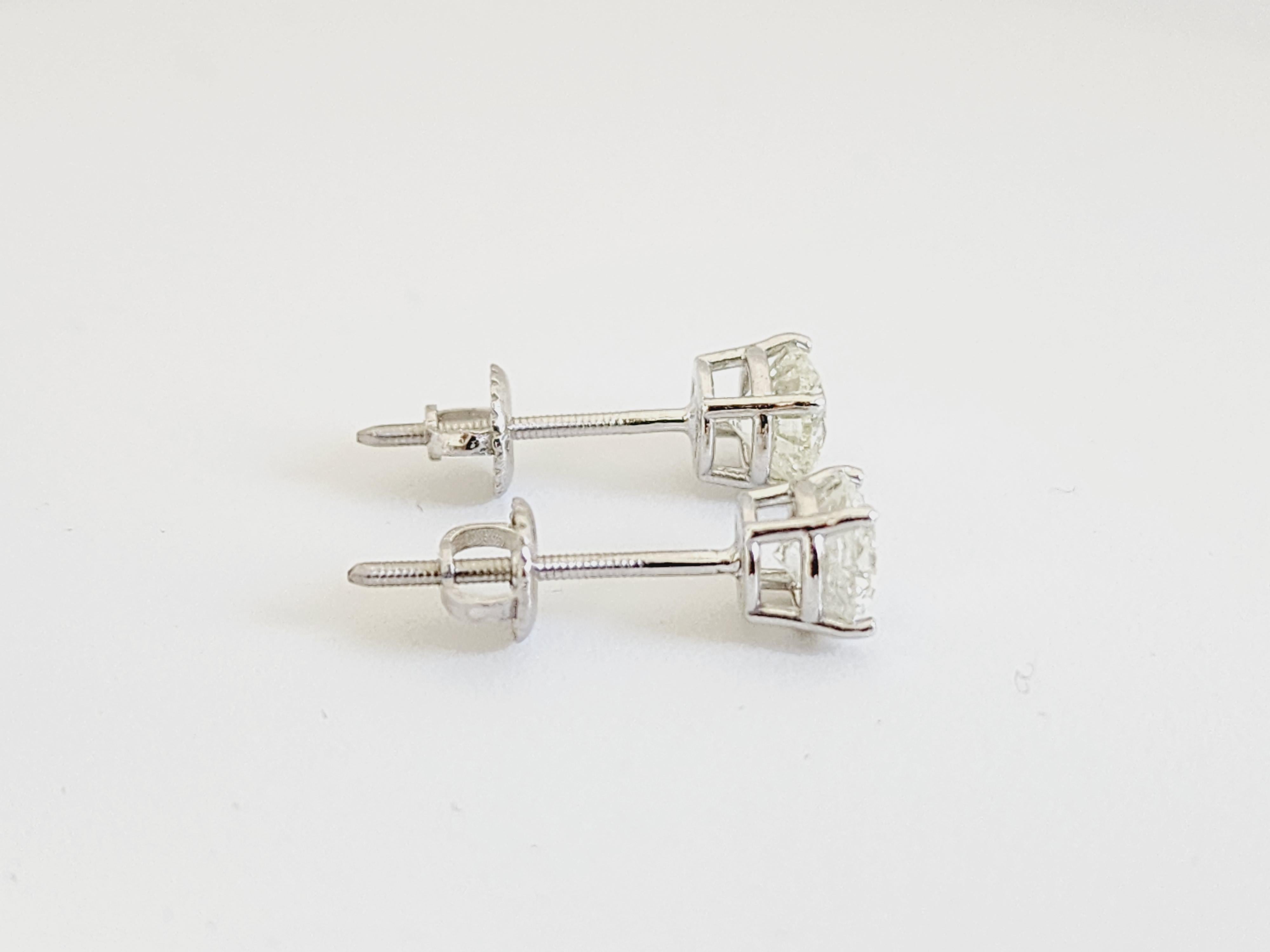 1.78 Cttw Natural Diamond Round Studs. average color I-j clarity i1.