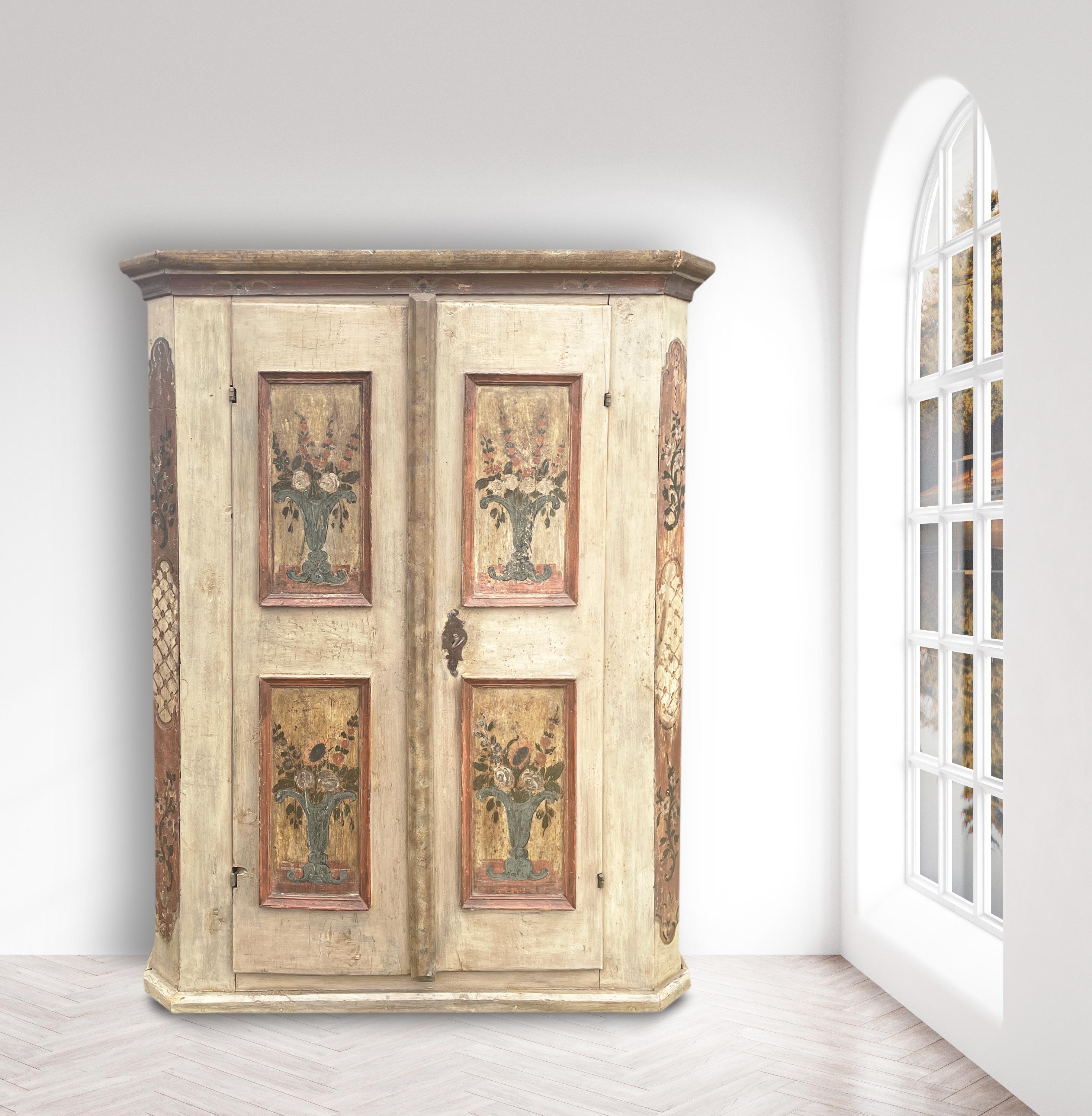 Antique White Tyrolean wardrobe

Period: approximately 1780
Origin: Tyrol (Northern Italy, Alpine Region)
Essence: Fir
Height: 165cm
Width: 122cm (132cm at the frames)
Depth: 43 cm (48 cm at the frames)

Tyrolean painted wardrobe with two doors,