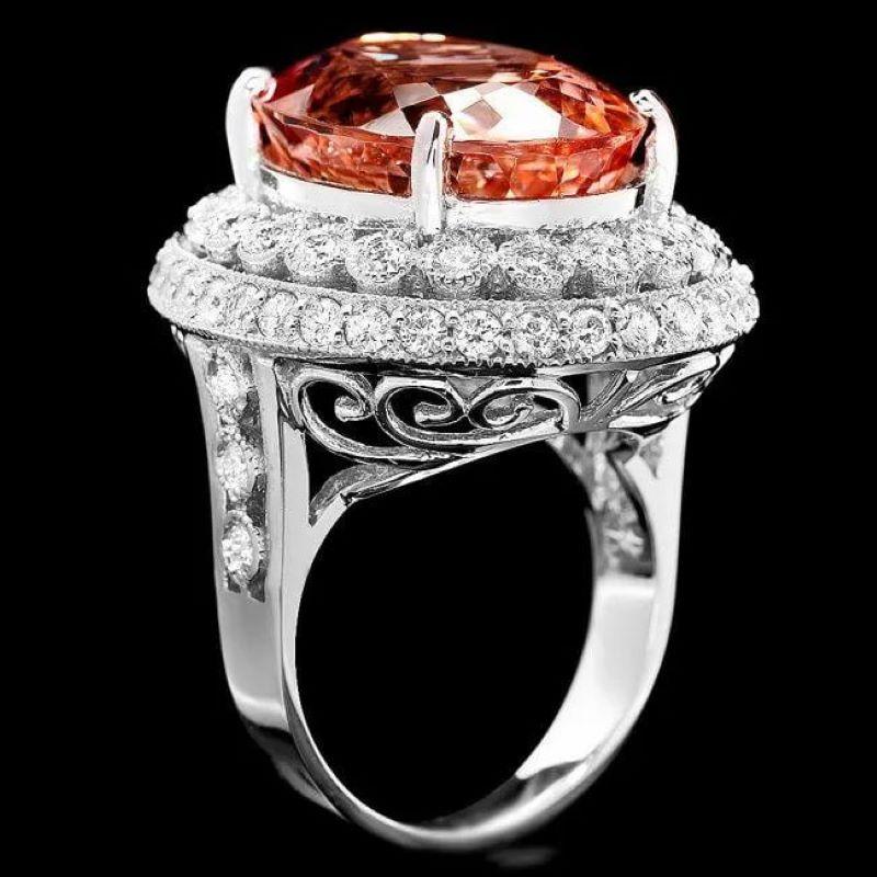 17.80 Carats Natural Morganite and Diamond 14K Solid White Gold Ring

Total Natural Morganite Weight is: Approx. 16.10 Carats 

Morganite Measures: Approx. 18 x 14 mm

Natural Round Diamonds Weight: Approx. 1.70 Carats (color G-H / Clarity