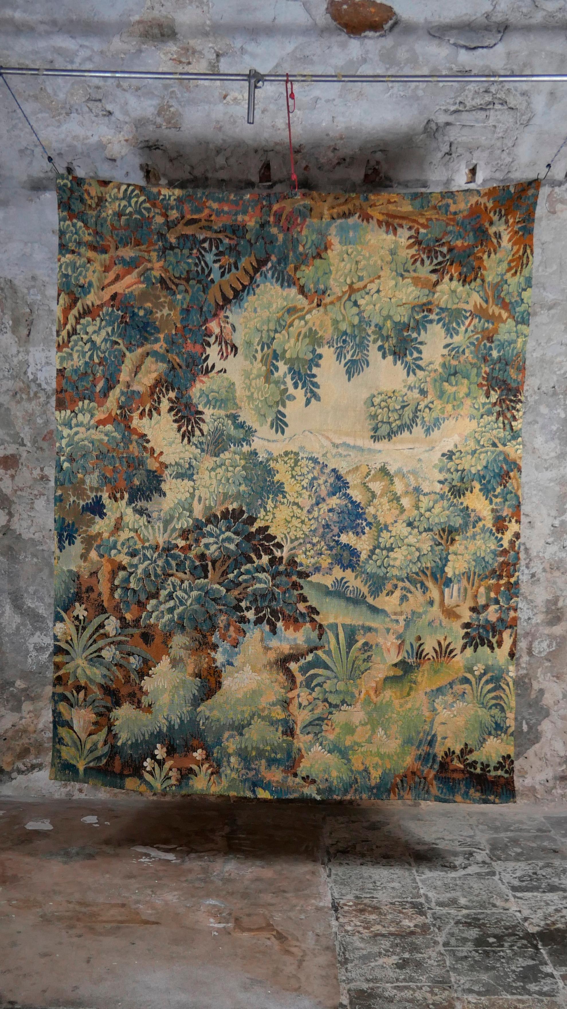 This particular tapestry is a Verdure Aubusson circa 1780 / 1790. ‘Verdure’ (foliage) tapestries were woven throughout the 17th and 18th Centuries, featuring wooded landscapes, reflecting the interest in botanical themes during this