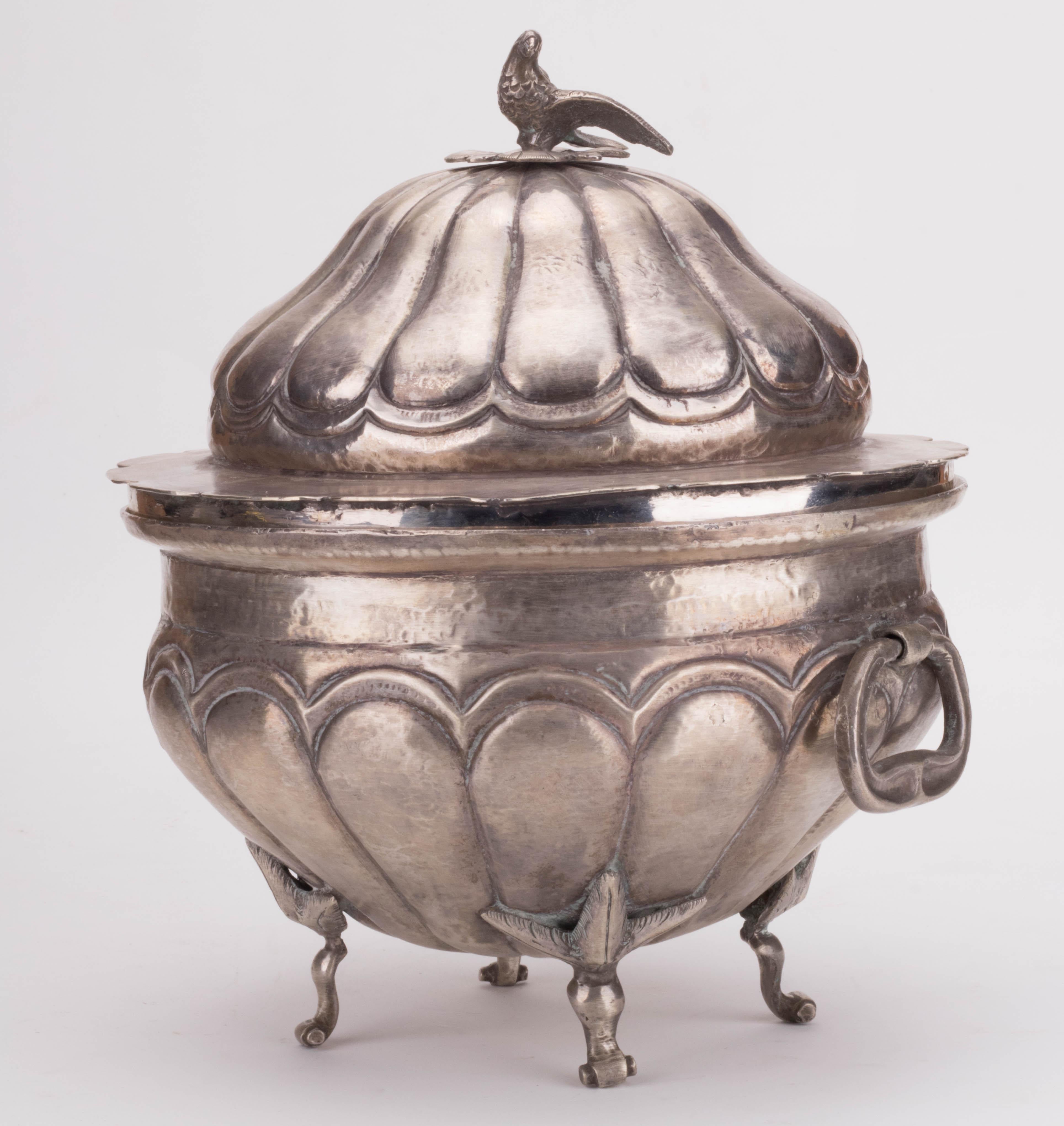1780s colonial Peruvian tureen with side handles and dove shaped knob on lid. 

Silver by weight: 1.330 g.