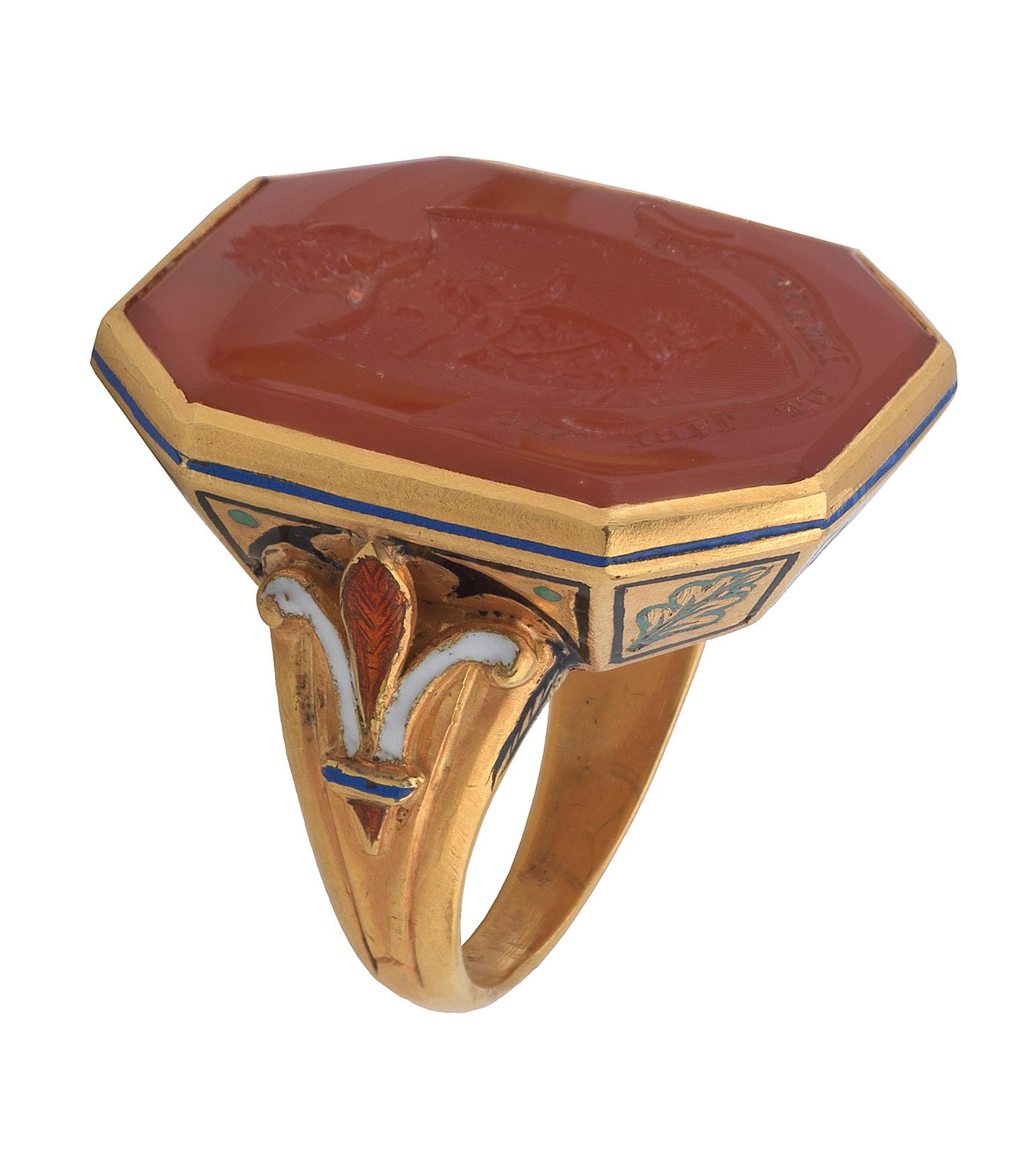 Bernardo Antichità Ponte Vecchio Florence 

With an square carnelian engraved with a family coat-of-arms depicting a lion crest and motto 'Fac Alteri Ut Tibi Vis', the gem set in a gold and enamel revival renaissance style 
Mounted in gold.
The