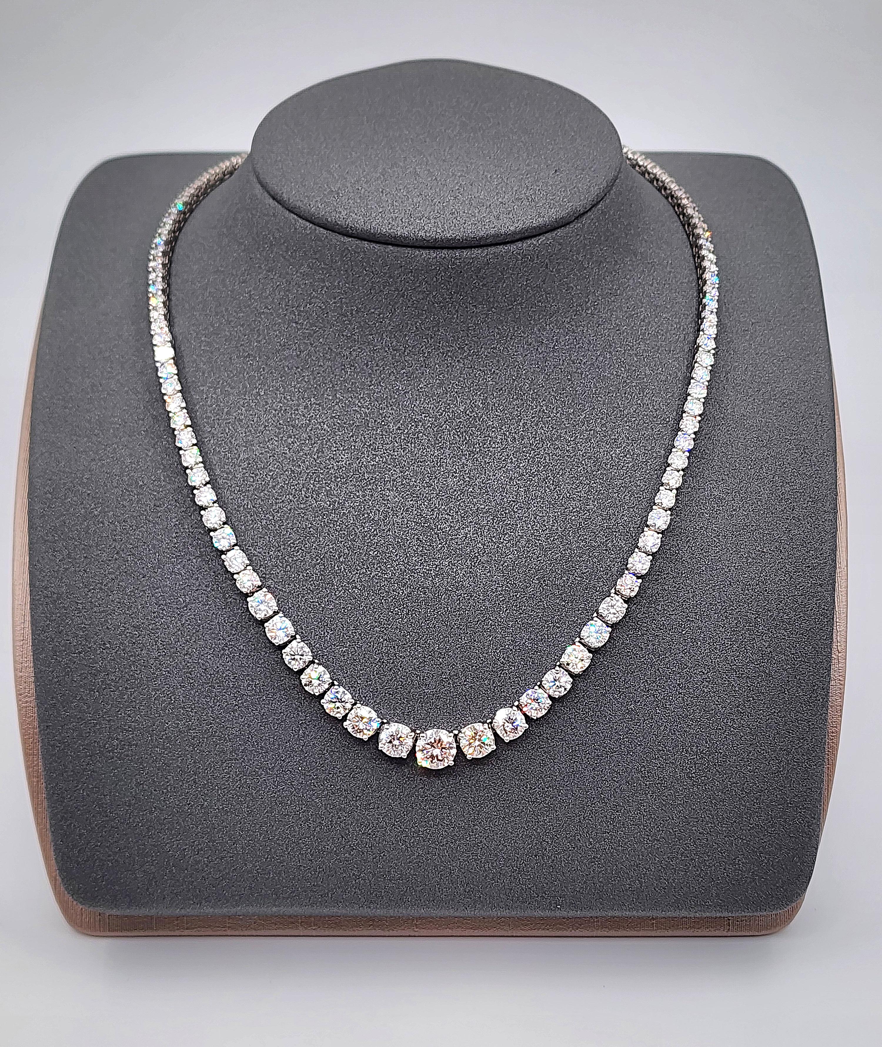 This stunning graduated diamond necklace features 111 diamonds weighing 17.89 ct set in platinum. The diamonds boast a color of F/G with a clarity of VS2/SI1. This must-have piece is a definite showstopper for any wardrobe. 
