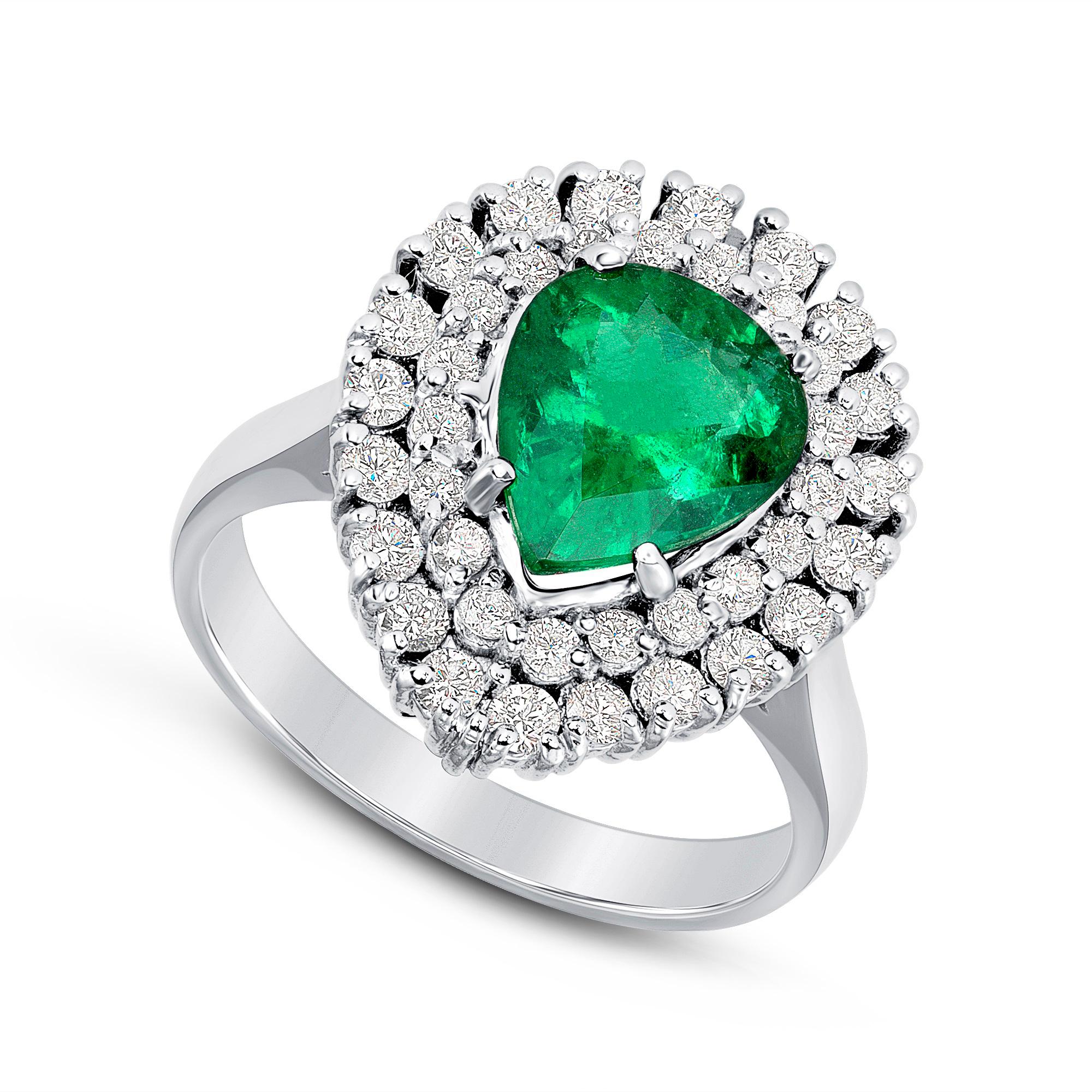 NATURAL Emerald 1.78ct / Diamond 0.82ct E-F Color VS Quality very well cut / 18K White Gold 6.3gm #GVR1682
This exquisite 1.78ct Emerald cut glows like a clear mountain lake as the light plays over it. This Pear-shaped Emerald is believed to help