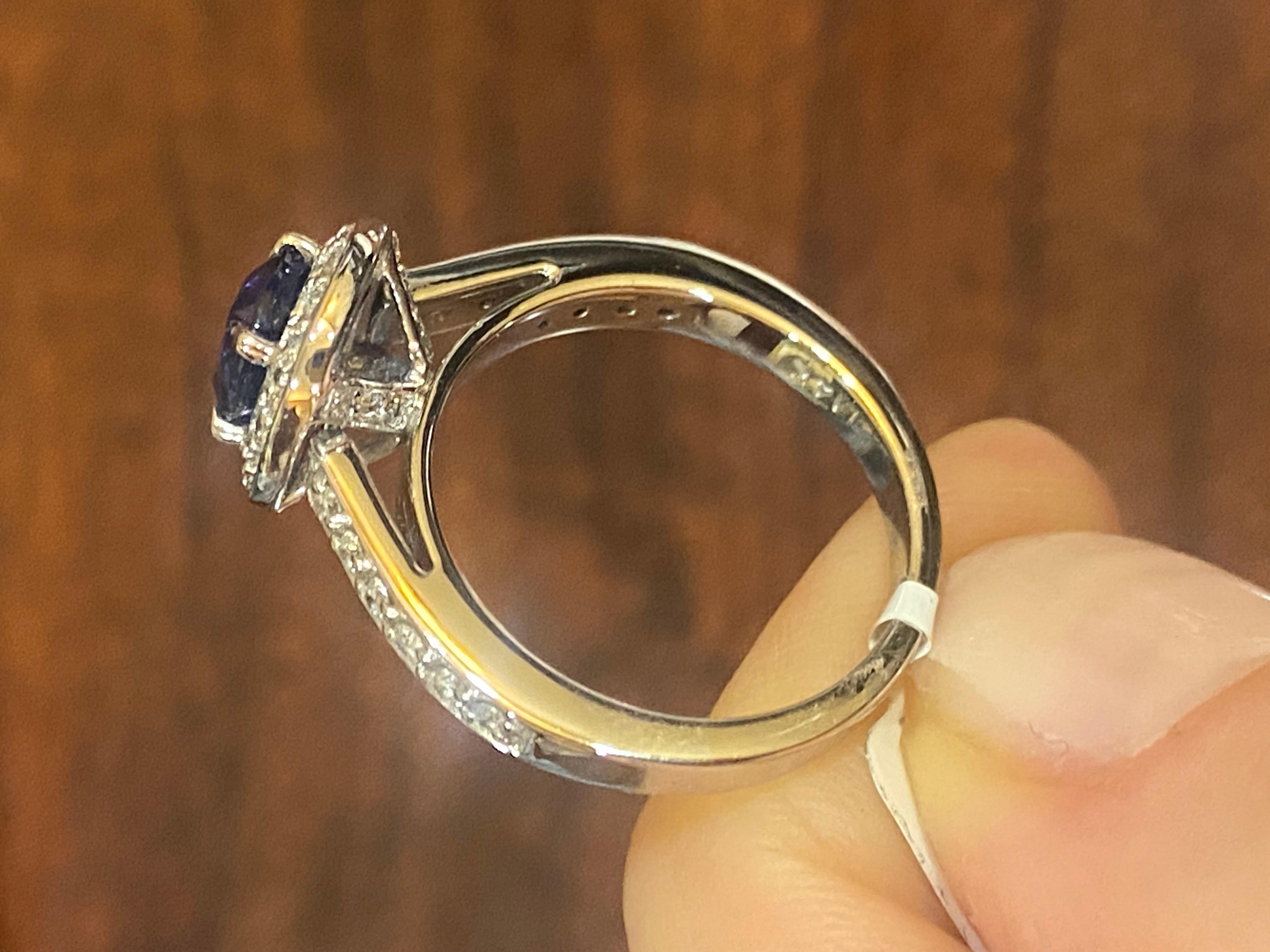 Modern 1.78ctw Emerald Cut Sapphire & Round Diamond Halo Ring in 14KT Gold For Sale