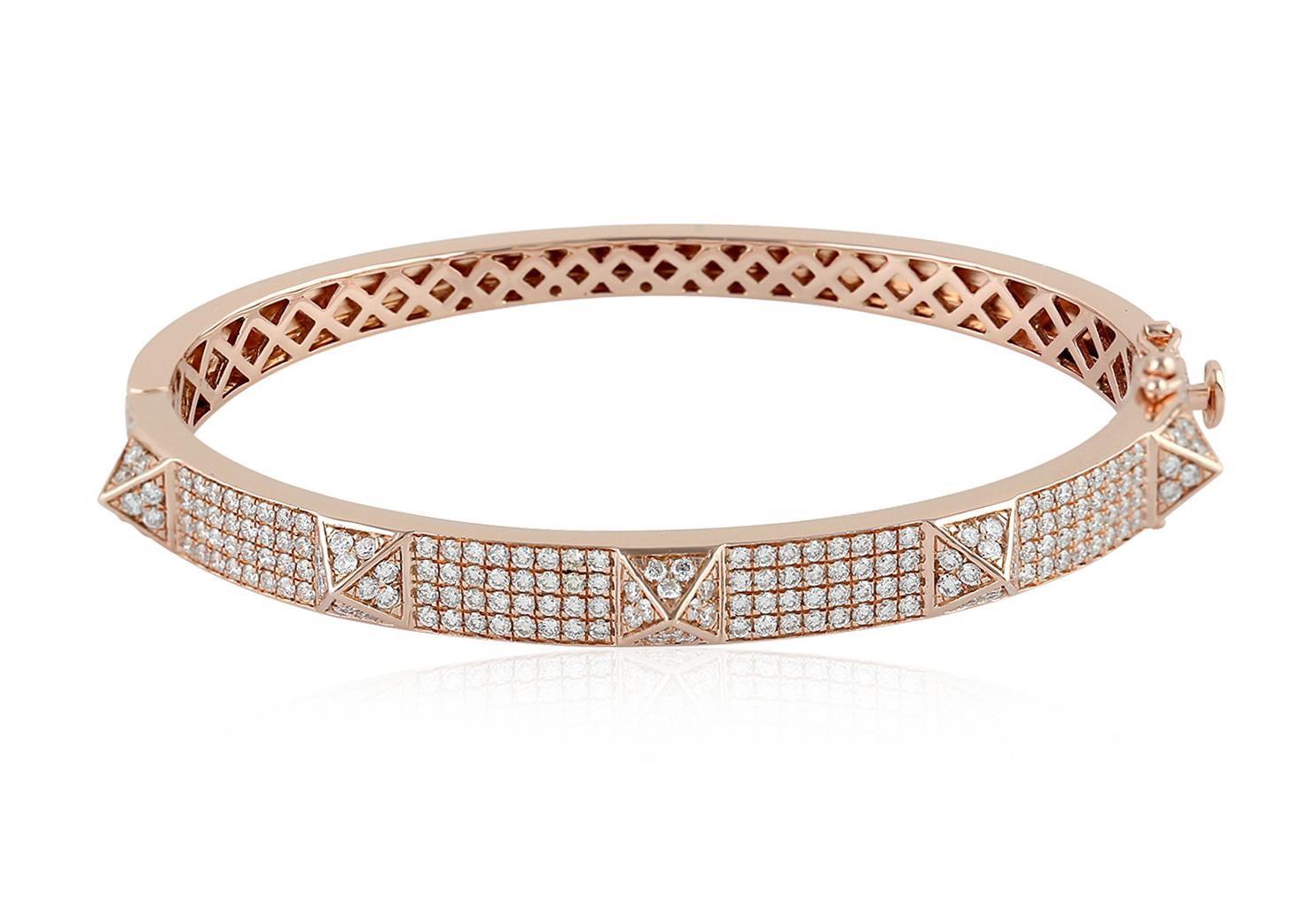 A spike bangle bracelet handmade in 18K rose gold and set with 1.79 of sparkling diamonds.  Also available in yellow gold. Clasp Closure

FOLLOW  MEGHNA JEWELS storefront to view the latest collection & exclusive pieces.  Meghna Jewels is proudly