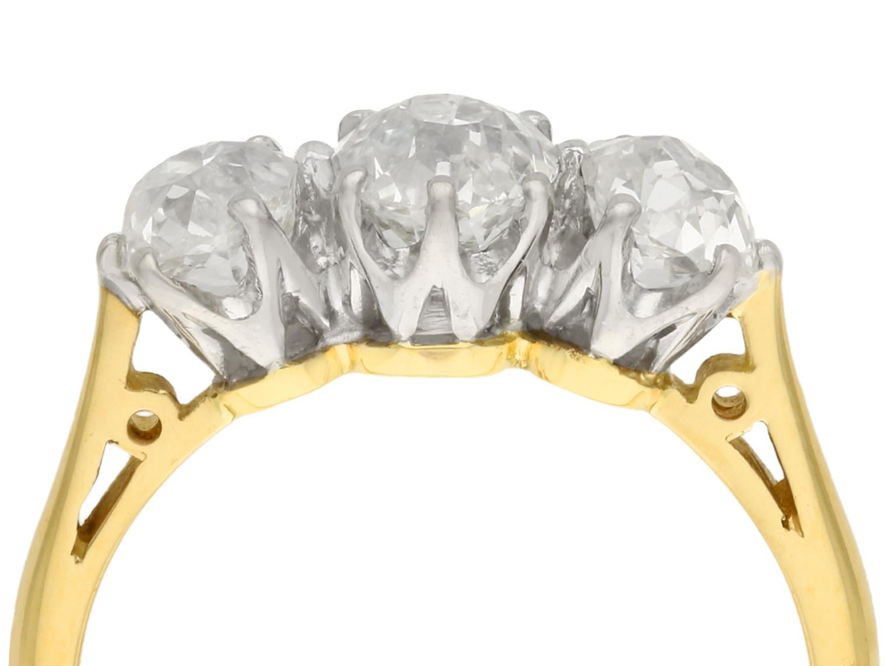 Old European Cut 1.79 Carat Diamond Three-Stone Engagement Ring in Yellow Gold