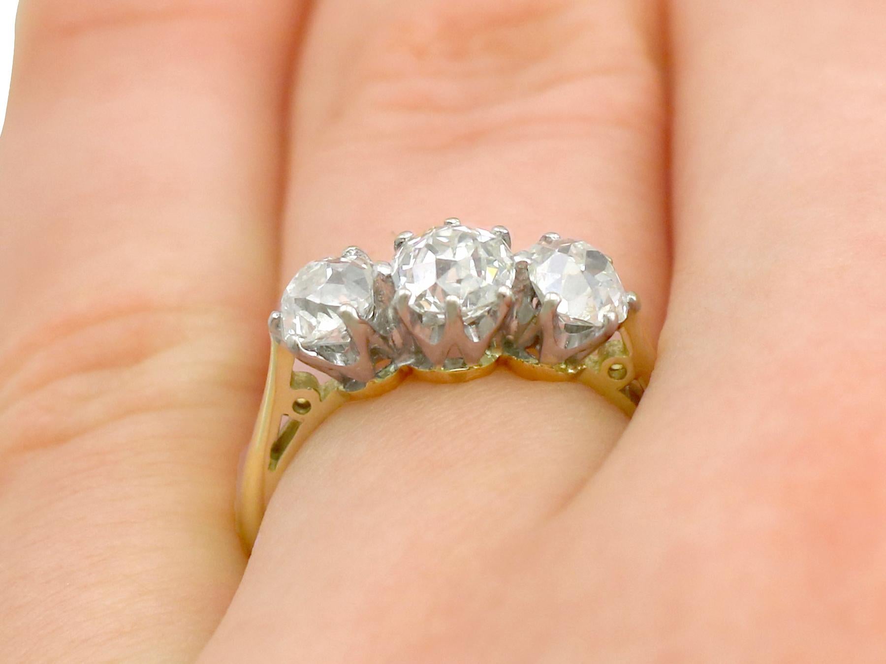 1.79 Carat Diamond Three-Stone Engagement Ring in Yellow Gold 4
