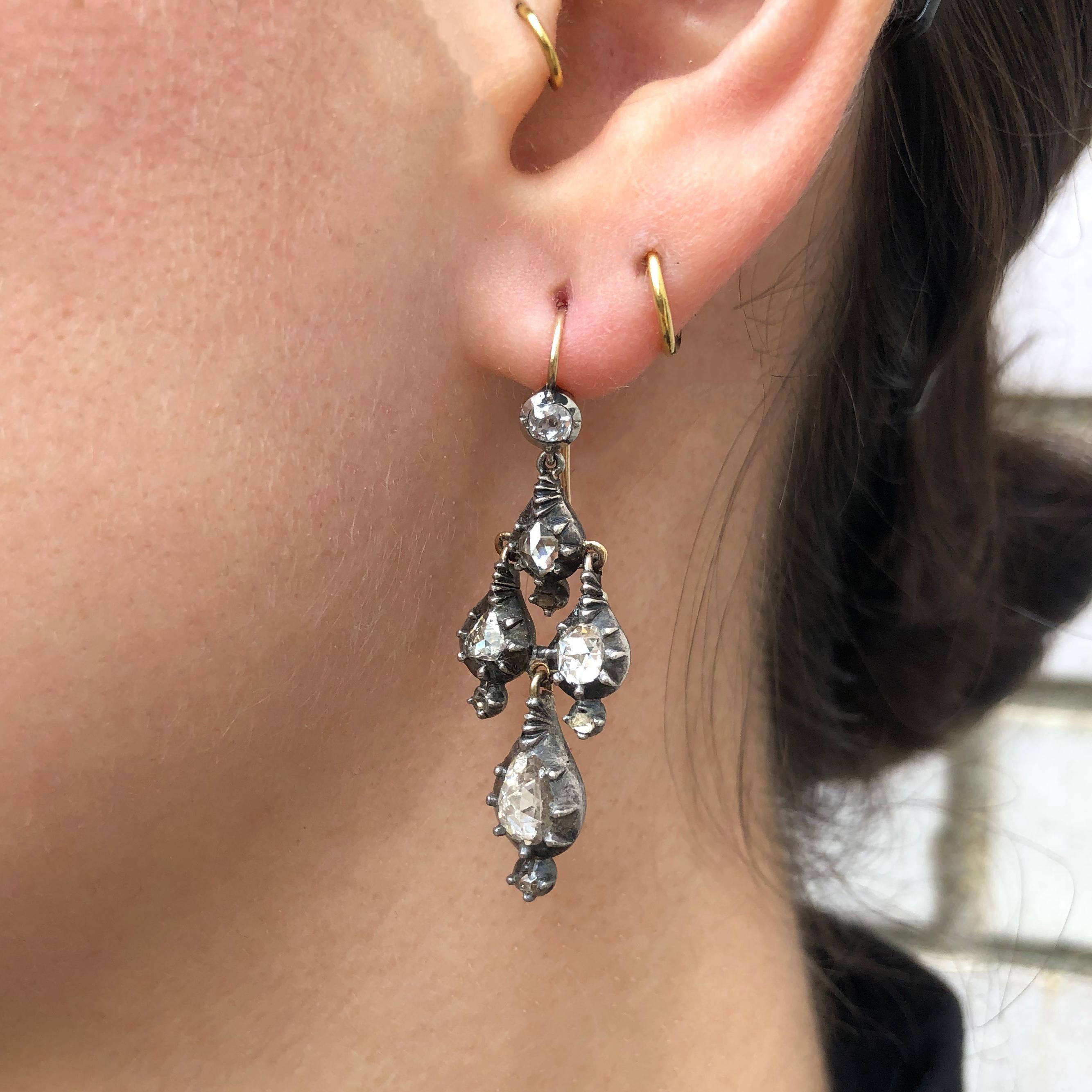 A pair of foil-back diamond, gold and silver girandole earrings, 1790s.

French ear wire likely added at later date. Earrings measure 1.75
