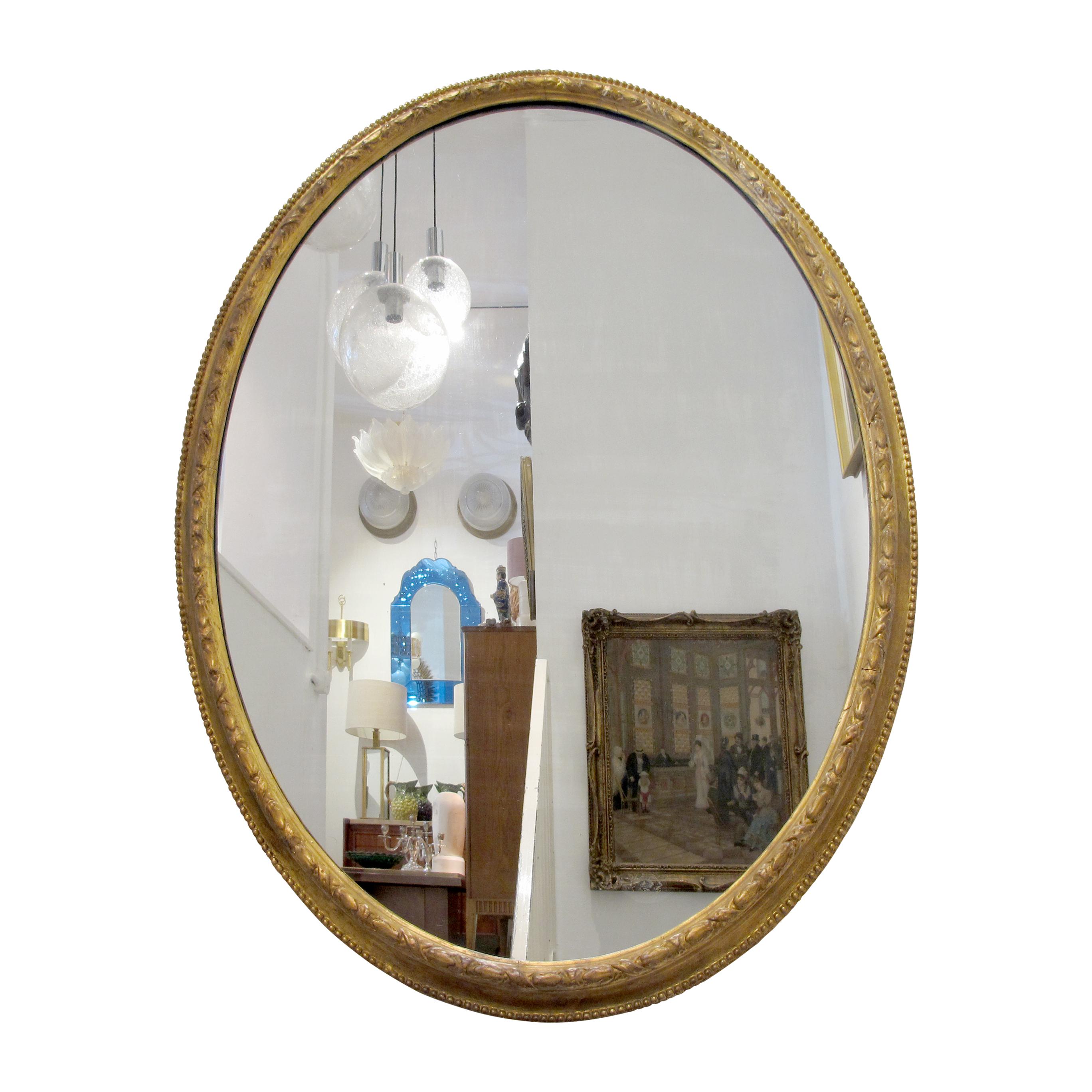 This large elegant mirror captures the essence of Georgian design, characterized by its classical proportions and ornamentation. The gesso gilt wood frame is in great condition and with its original mirror with little sign of foxing. 

Size: H138 cm