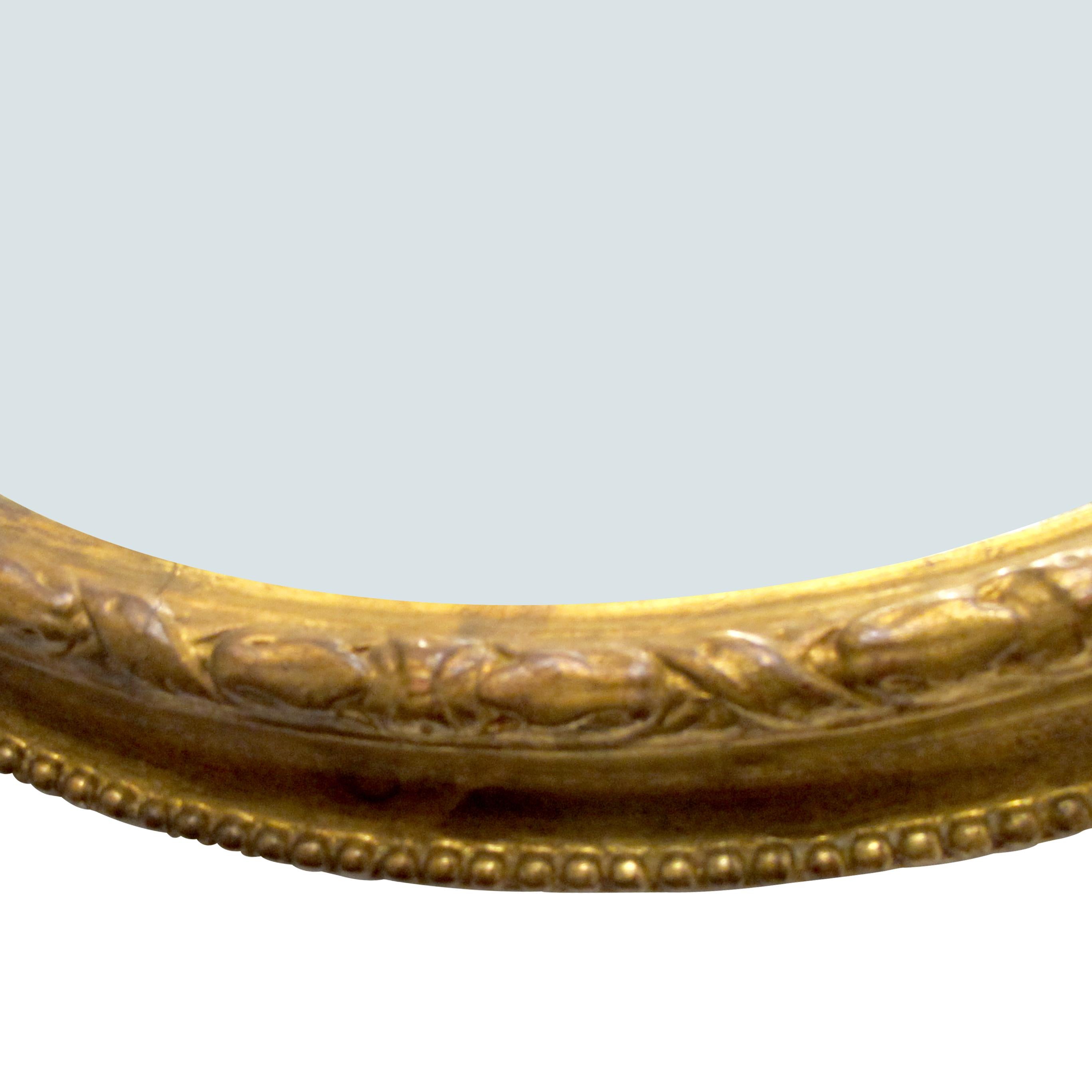 Britannique Grand miroir ovale géorgien des années 1790 avec cadre en bois doré, anglais  en vente