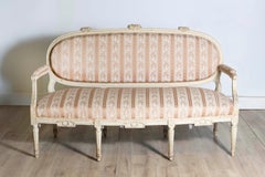 1790s Louis XVI Period French Painted Sofa with Oval Back and Carved Foliage