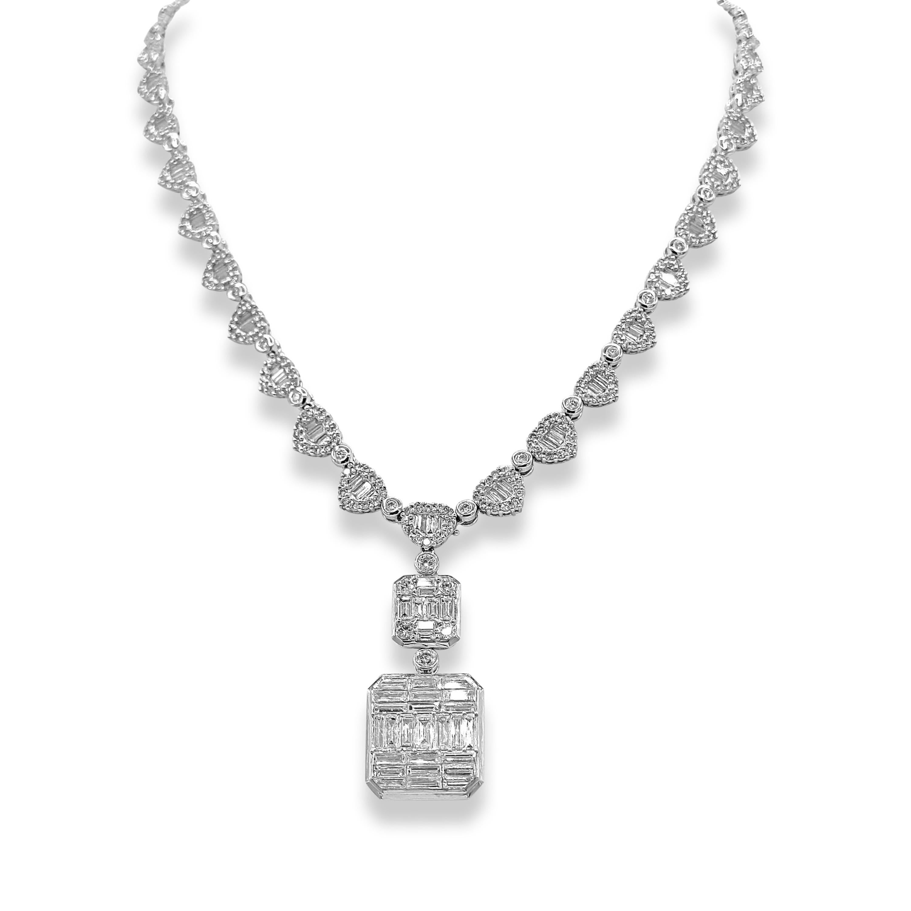 499 White Round Diamonds: 7.97 Carats
160 Baguette cut Diamonds: 9.97 Carats
Metal: 18K White Gold, 49.1 Grams
