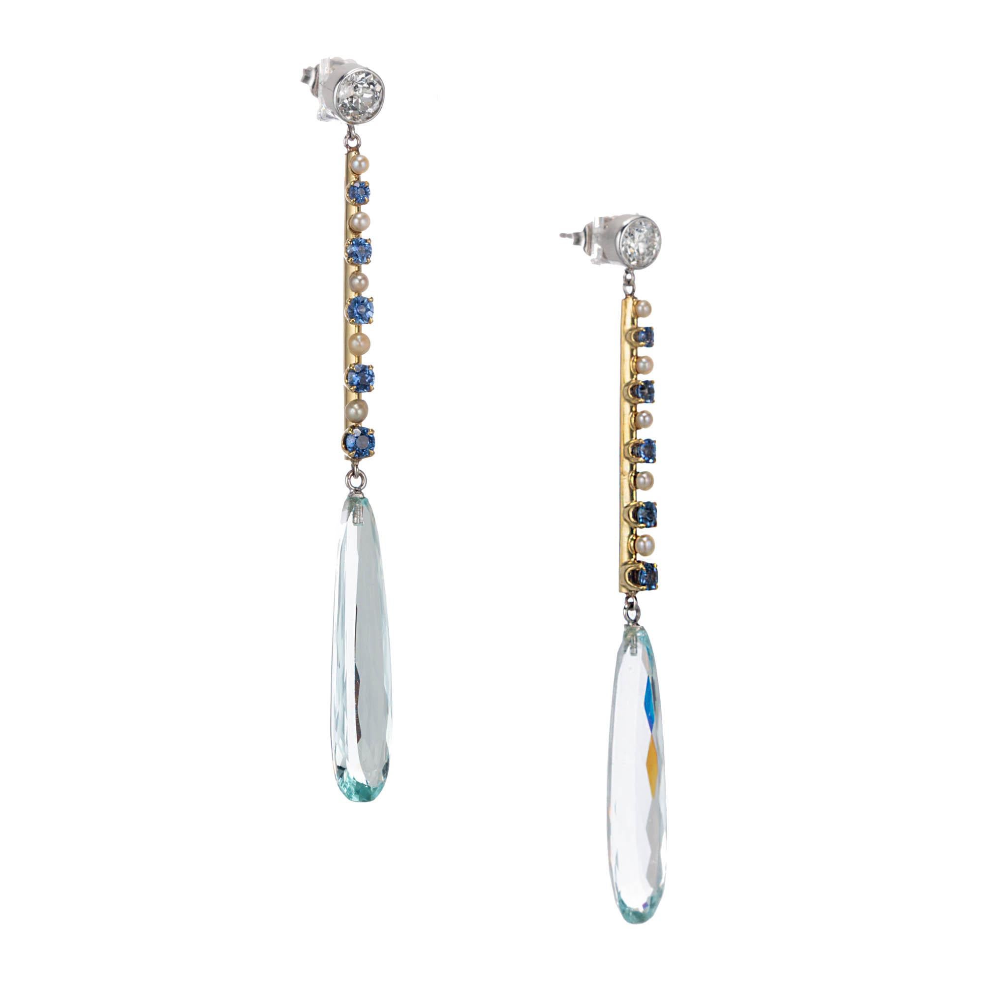 Aqua, sapphire, diamond and pearl dangle drop earrings. Set in platinum and 14k yellow white gold. Old European cut diamond tops in platinum. Center section in yellow gold with natural Montana sapphires and natural pearls. Two modified pear shaped