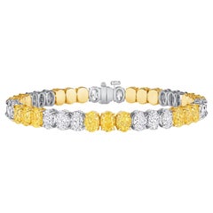 17.96ctw. Fancy Intense Yellow Diamond & GIA Oval Diamond Tennis Bracelet