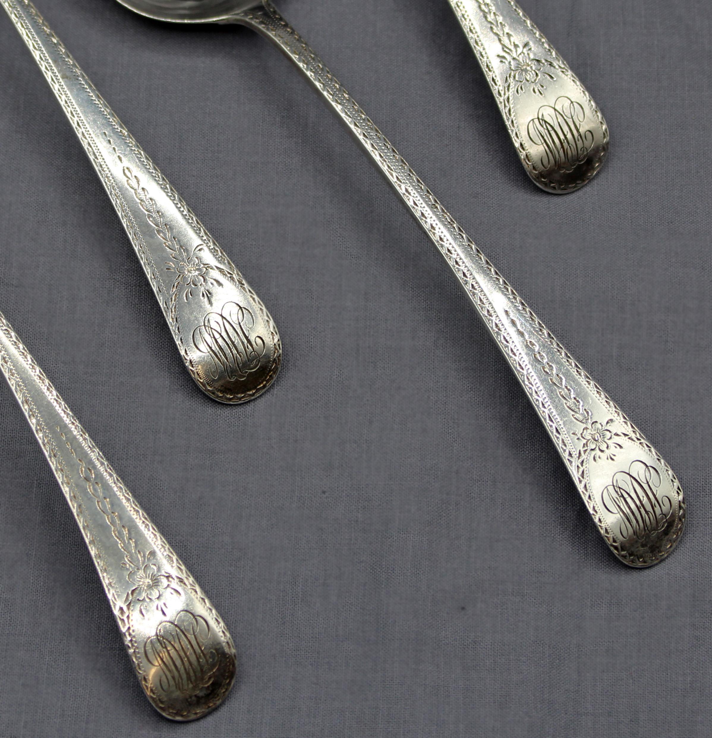 London, 1797, set of 4 Old English engraved pattern sterling silver spoons (suitable as tablespoons) by Peter & Ann Bateman. Later monograms. Elegant bright-cut Classical work was a hallmark of the Bateman family's silver. 7 troy oz.
8 1/2