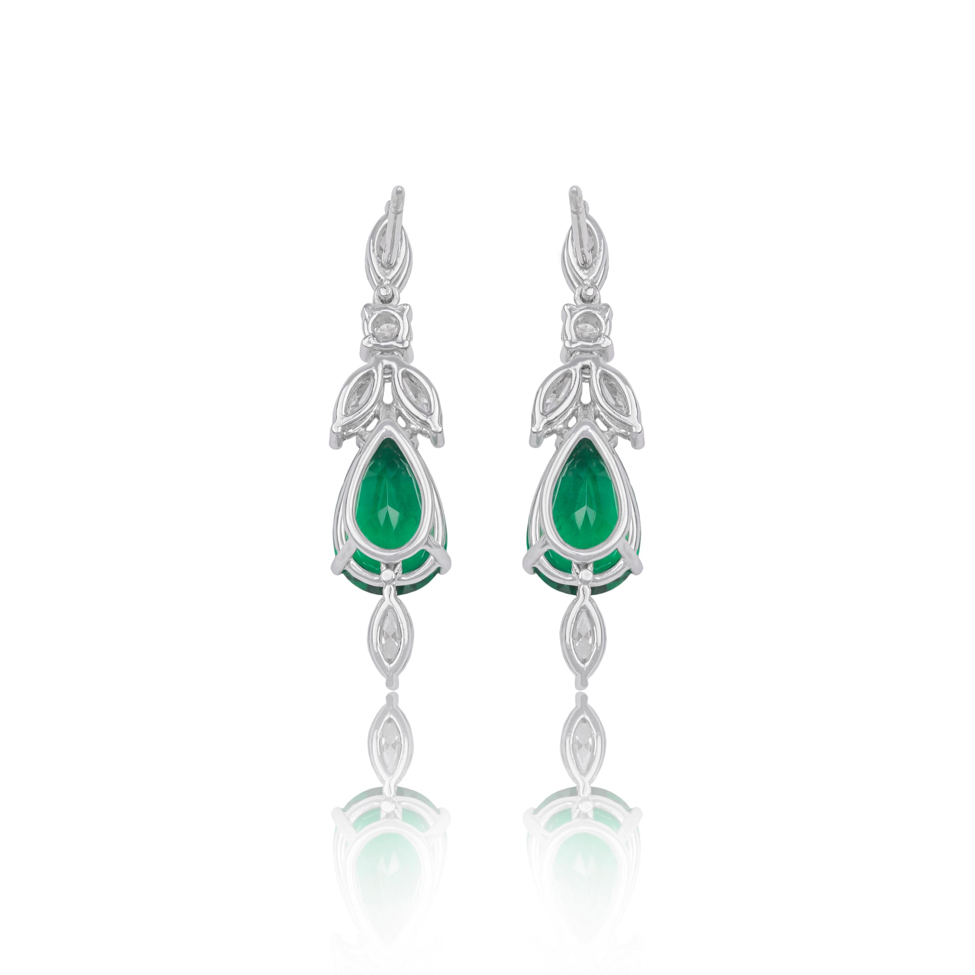 Contemporary 1.79ct White Diamond and 4.23ct Pear Cut Emerald Earrings 