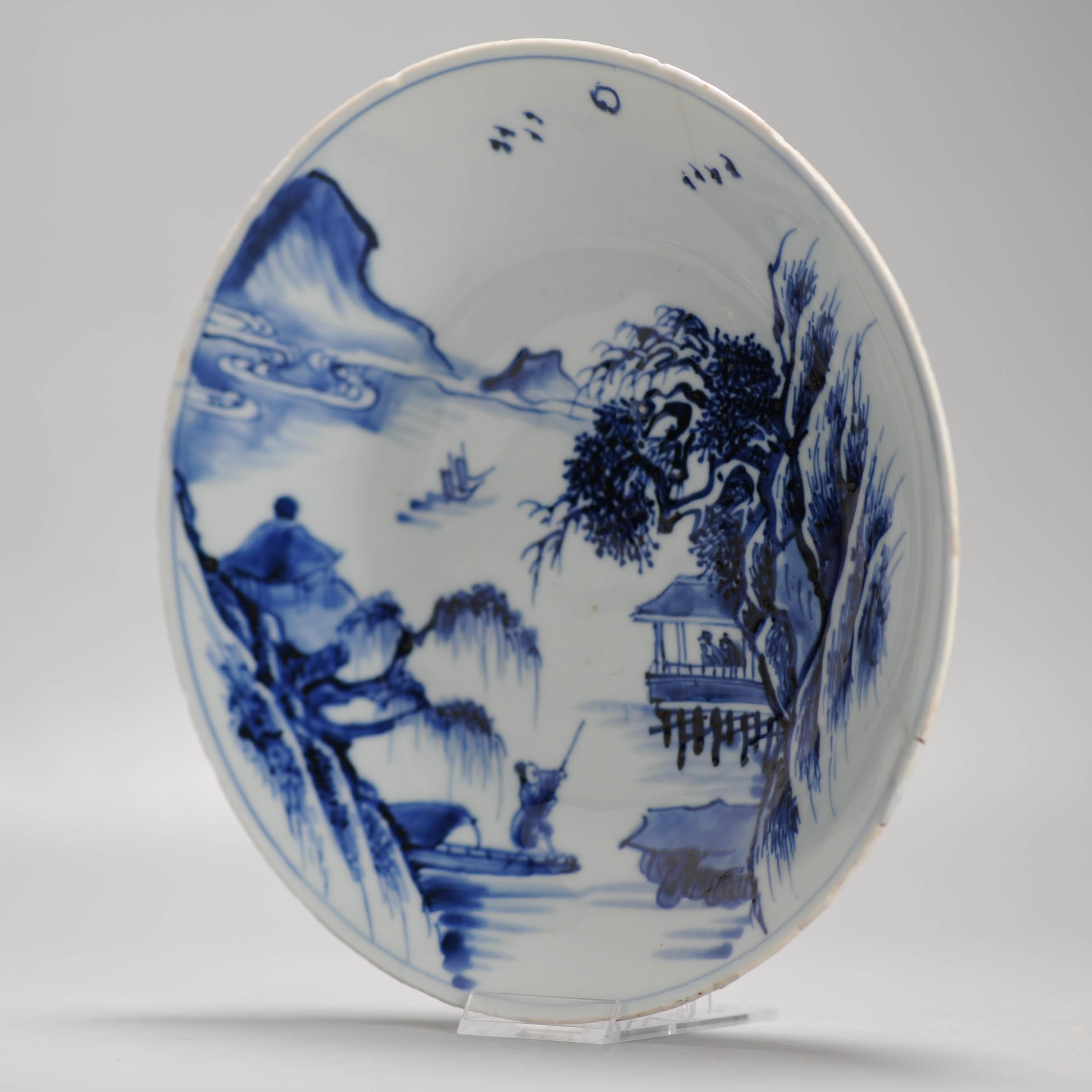 
Sharing with you this nice Chinese porcelain dish from the Kangxi period. It has a dark cobalt blue river landscape scene in master of the rocks style.
The base with bamboo and a 4 character mark.

Country of origin: China
Period: Kangxi, 17th