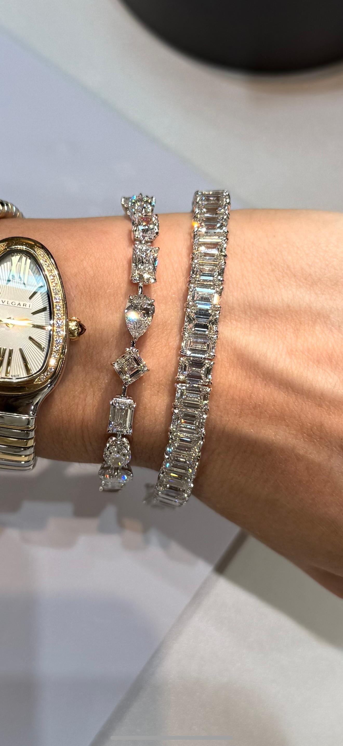 A timeless symbol of sophistication, this Alder Fine Jewellery Emerald-Cut Diamond Tennis Bracelet is a dazzling statement of refined luxury. Crafted in 18k white gold, it features emerald-cut diamonds totaling approximately 17 carats. Each 0.40ct