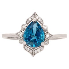1.7cts London Blue Topaz Ring with Natural Diamonds: Solid 14k White Gold, 9x7mm