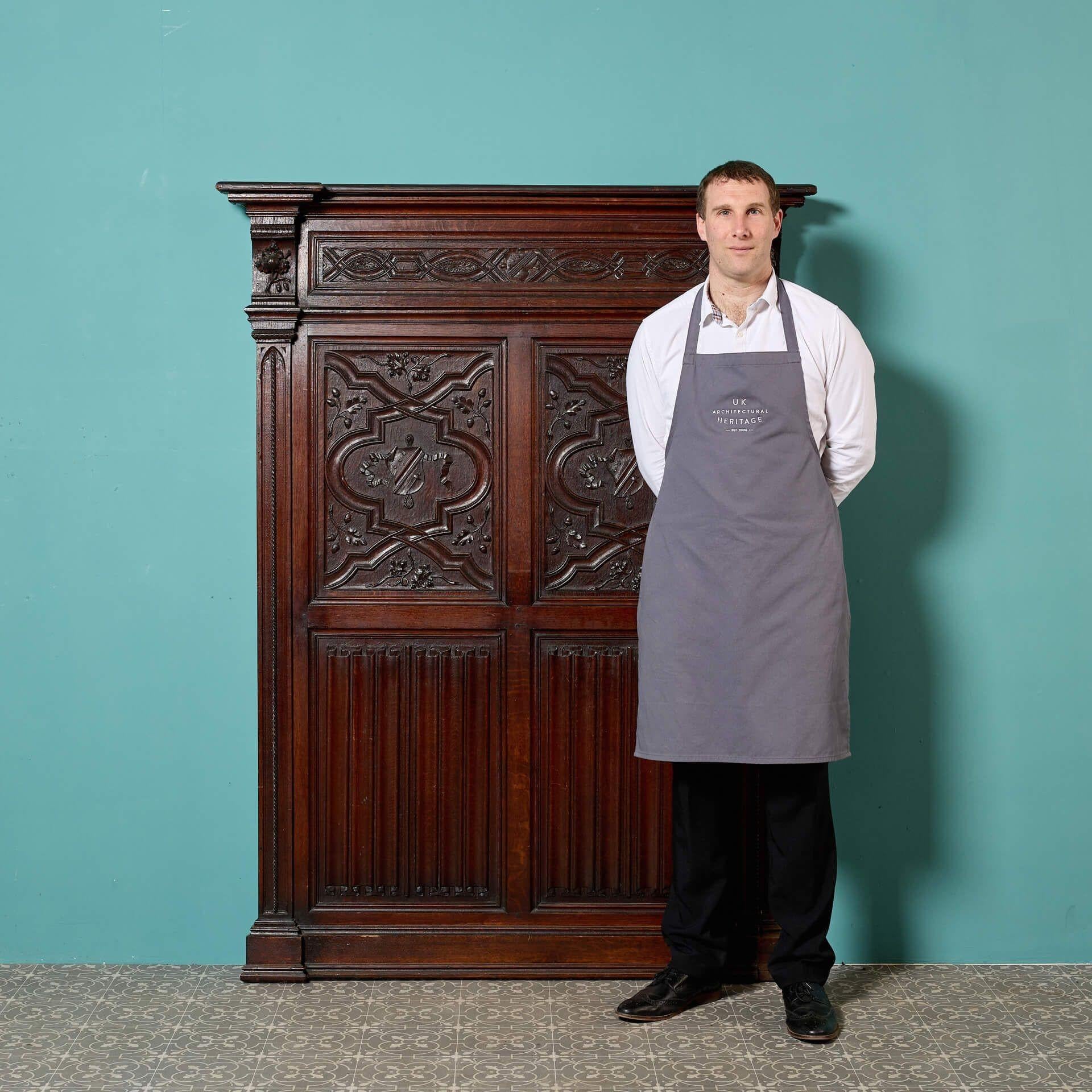 A good quality 17m run of late 19th century carved oak panelling with a rich oak colour and ornate varied carving, reclaimed from a property in Staffordshire.

Standing at ¾ height, this reclaimed wall panelling comprises of 20 solid oak wall panels
