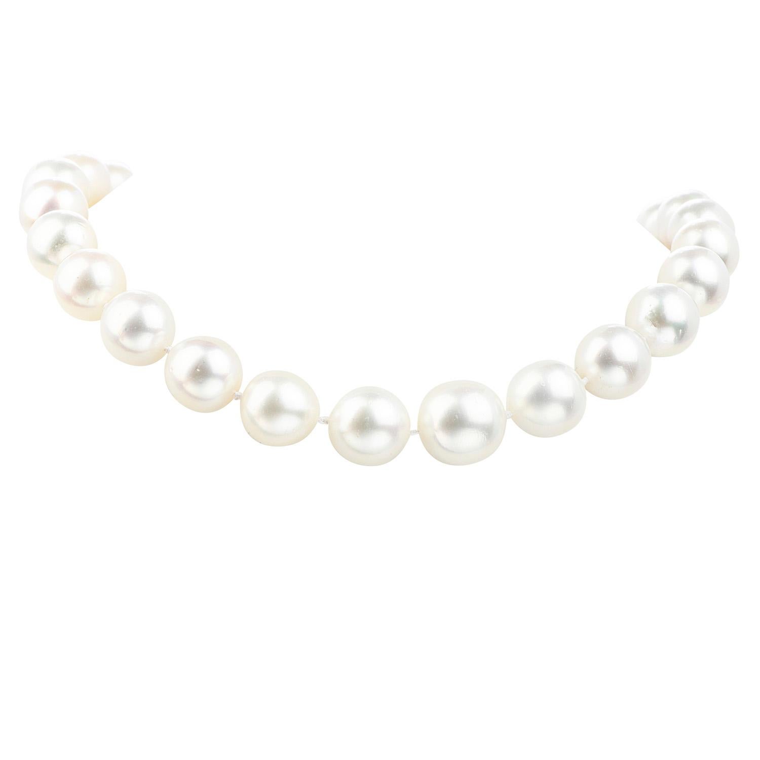 This exceptionally large South Sea Pearl necklace incorporates 33 highly lustrous South Sea pearls with some natural blemishes. The necklace is complemented by 27 graduated lustrous South Sea pearls measuring between 17mm to 14 mm. The necklace