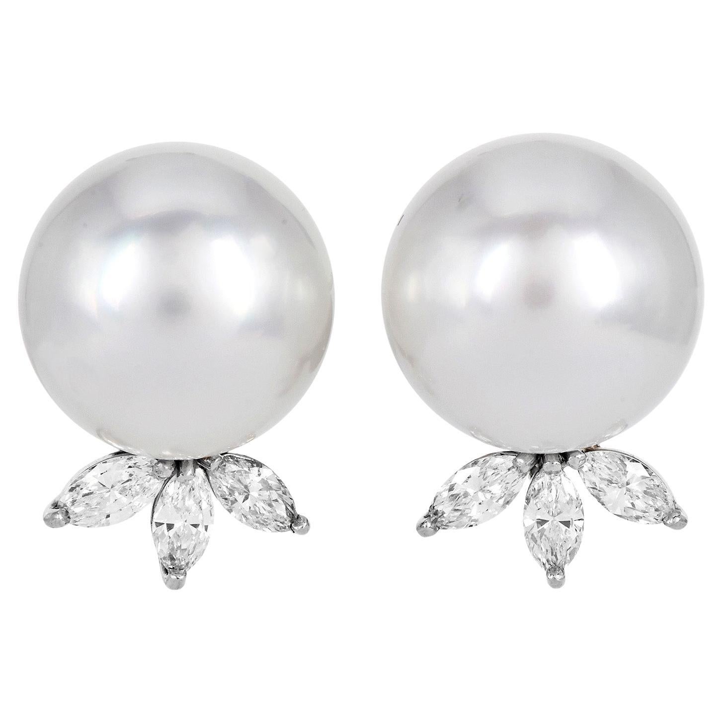 Presenting Elegant Southsea Pearl Stud Earrings, flawlessly crafted in platinum and secured with 18K white gold pushbacks. earrings are adorned with a natural marquise diamond flair, adding a sophisticated touch to this classic day-to-night