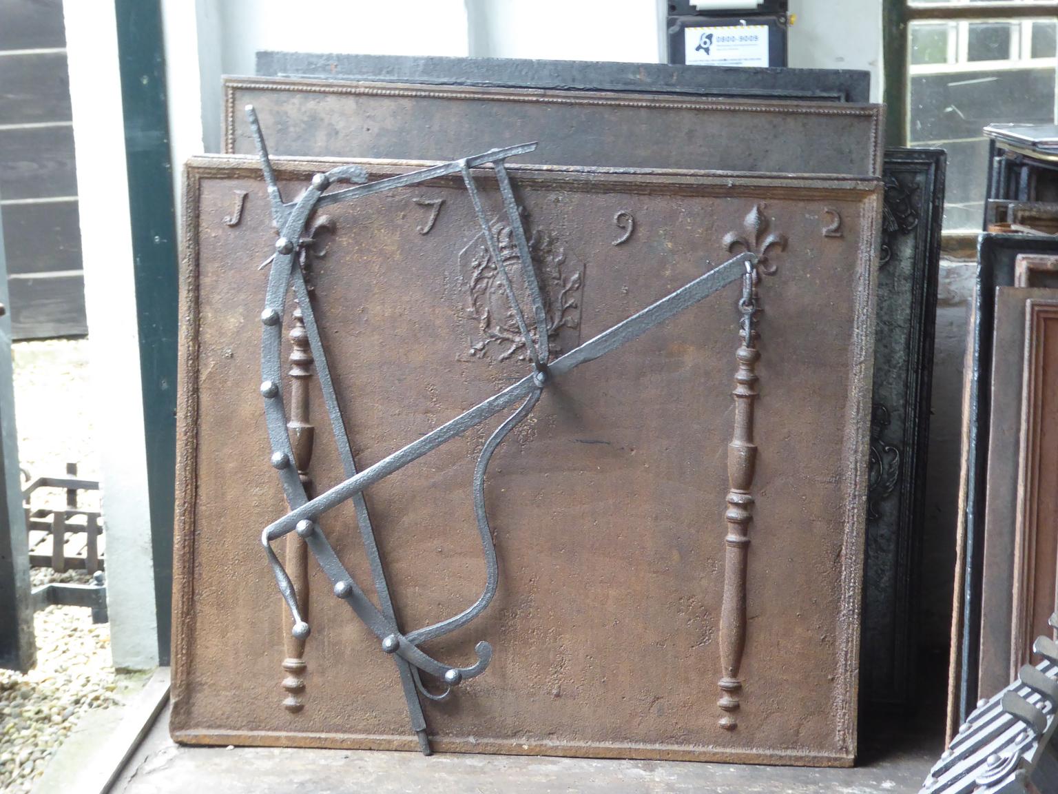 17th- 18th century Dutch fireplace crane made of wrought iron. The crane is still functional for cooking in the fireplace.

This product has to be shipped as freight due to its size and/or (volumetric) weight. You can contact us to find out the