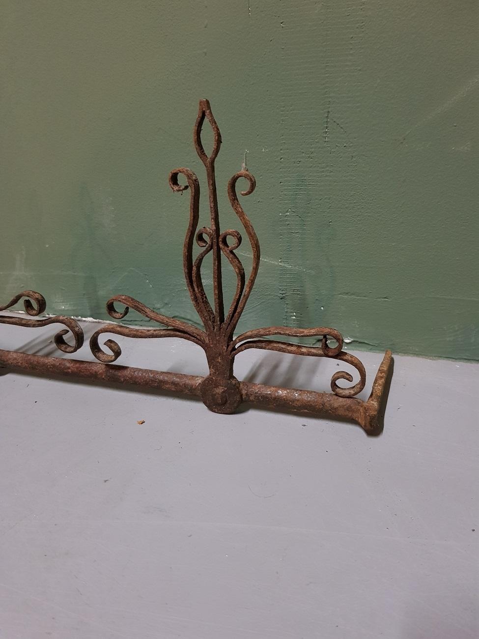 Hand-Crafted 17th-18th Century Dutch Wrought Iron Fireplace Tools Wall Rack For Sale