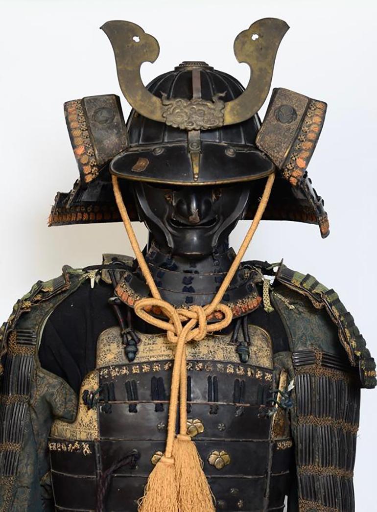 A set of Japanese Samurai armor.

Age: Japan, Edo Period, 17th - 18th Century
Size: Height 190.5 C.M. / Width 60 C.M.
Condition: Nice condition overall (some expected degradation due to its age).

100% satisfaction and authenticity guaranteed with