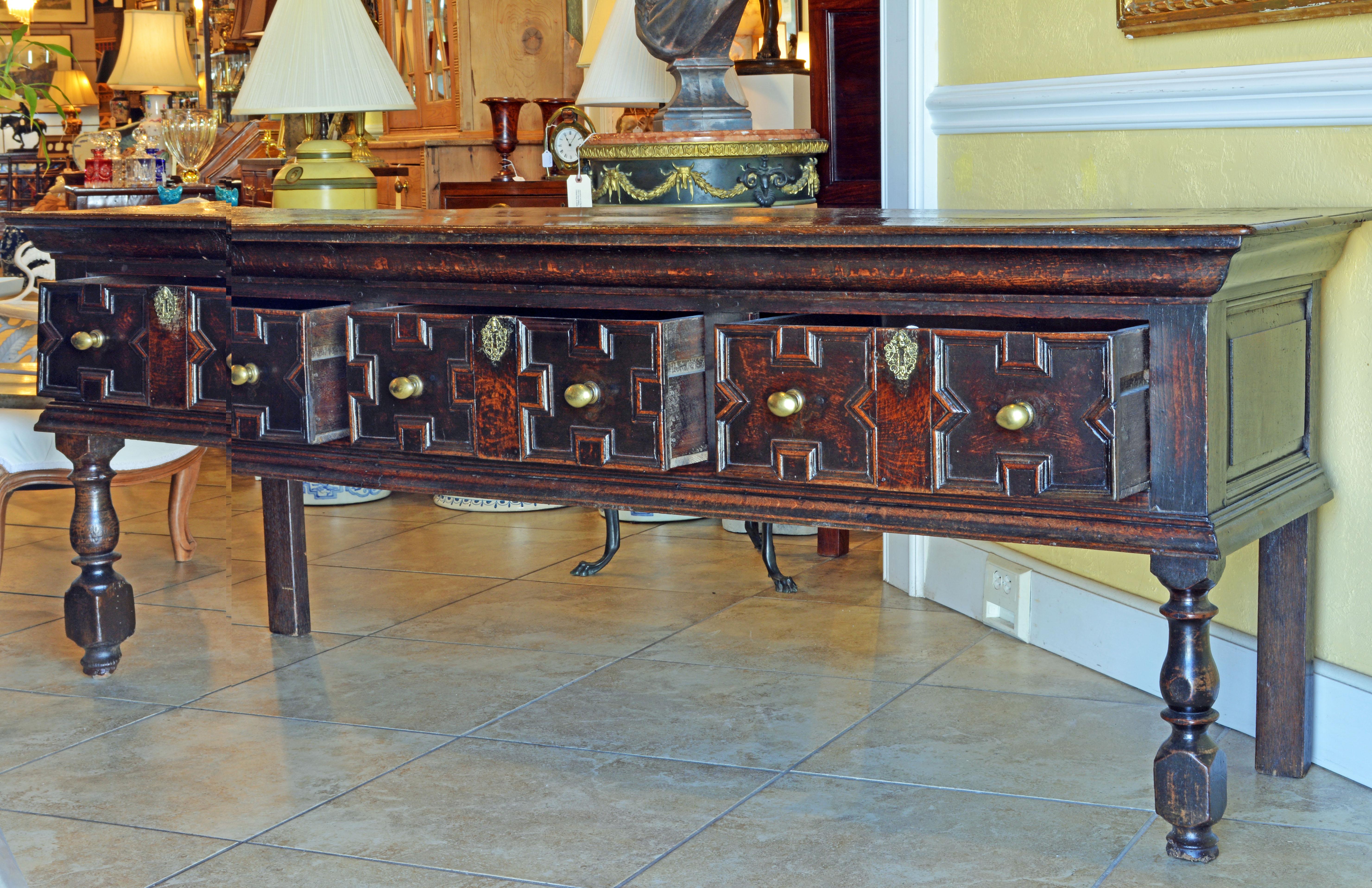 Rarely do we see furniture of this age in such good condition. Some restorations and repairs have naturally taken place during its long lifespan but the overall impression is that of authenticity. The dresser features a two plank top and molded
