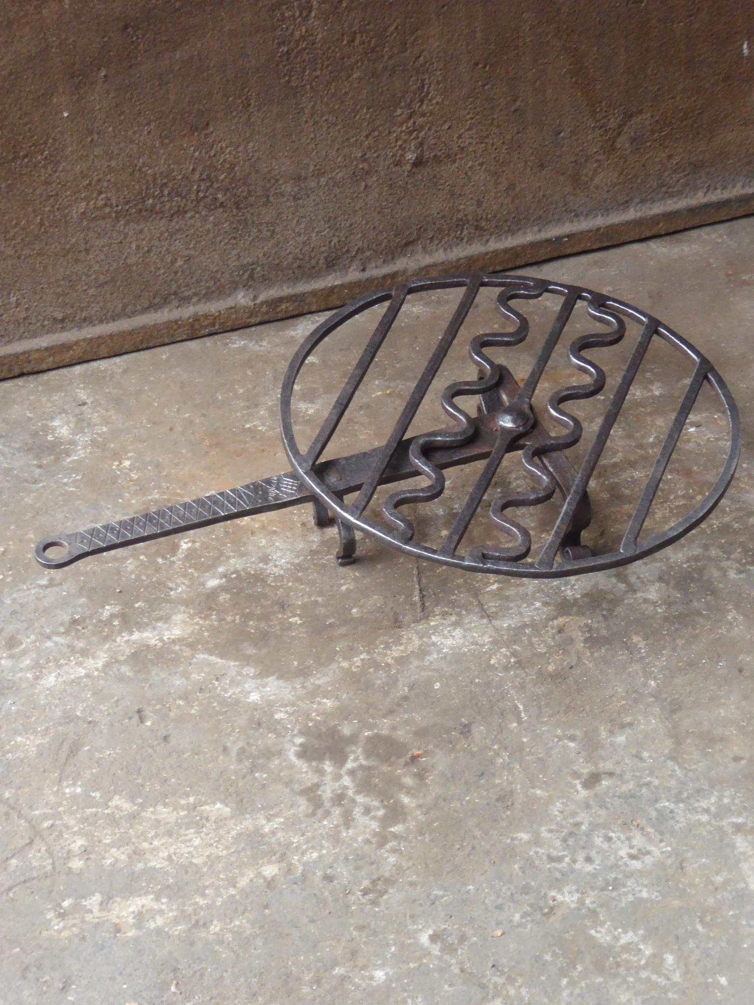Wrought Iron 17th-18th Century French Decorated Rotating Gridiron For Sale