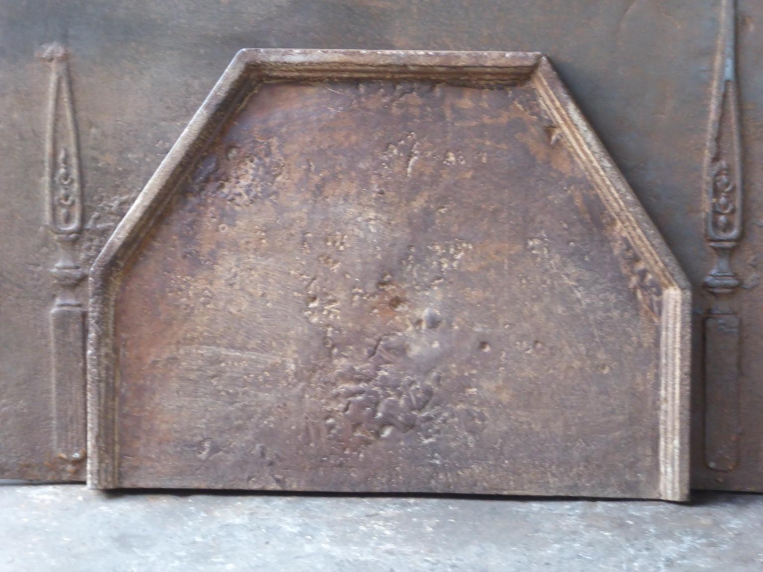 Beautiful 17th-18th century French fireback. The style of the fireback is Louis XIV and it is from that period.

The patina of the fireback is a natural brown, which can be made black or pewter upon request. The condition is good, no cracks.