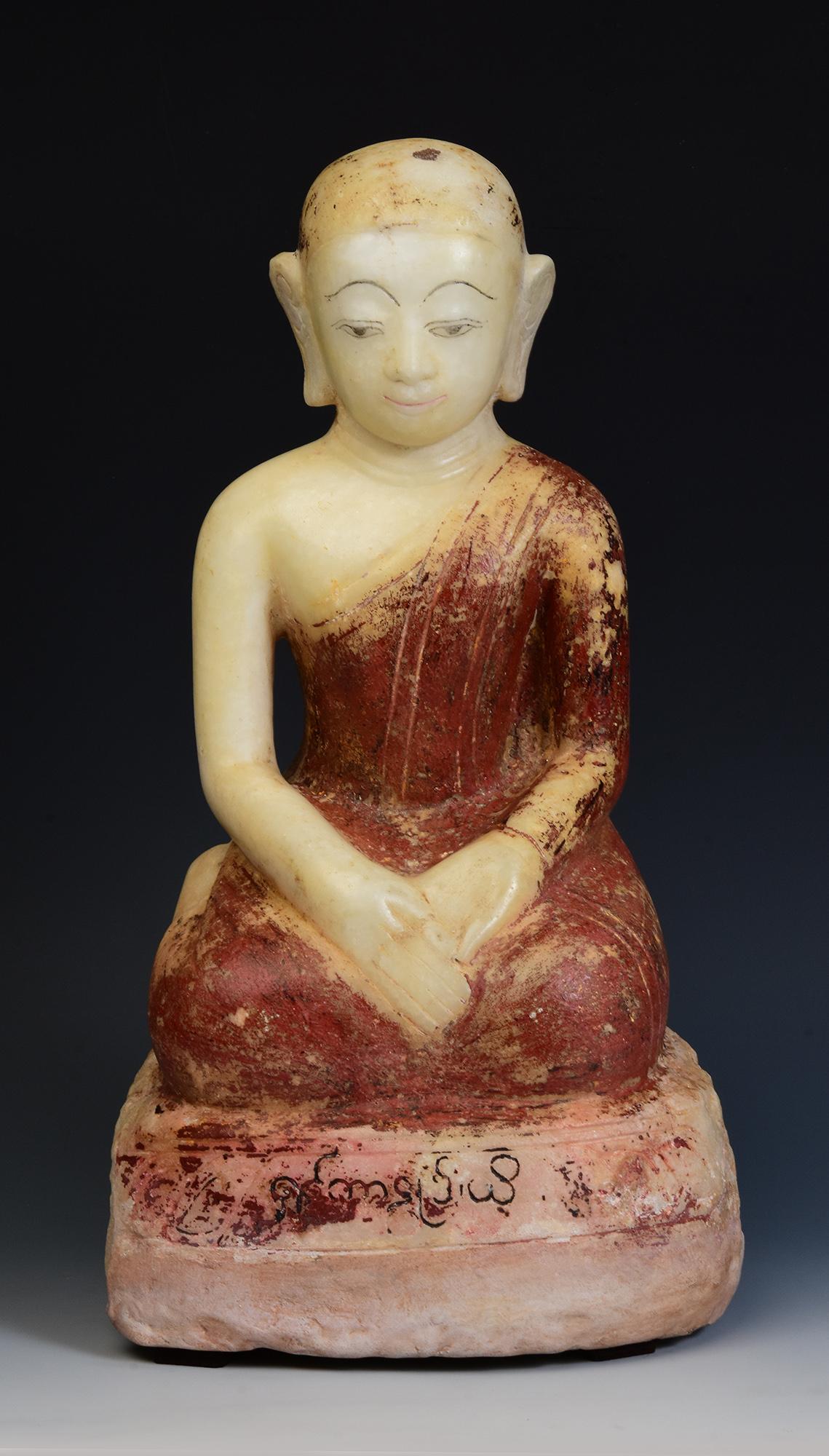 Antique Burmese alabaster seated disciple.

Age: Burma, Shan Period, 17th - 18th Century
Size: Height 45.3 C.M. / Width 23.8 C.M. / Depth 20 C.M.
Condition: Nice condition overall (some expected degradation due to its age).

100% Satisfaction and