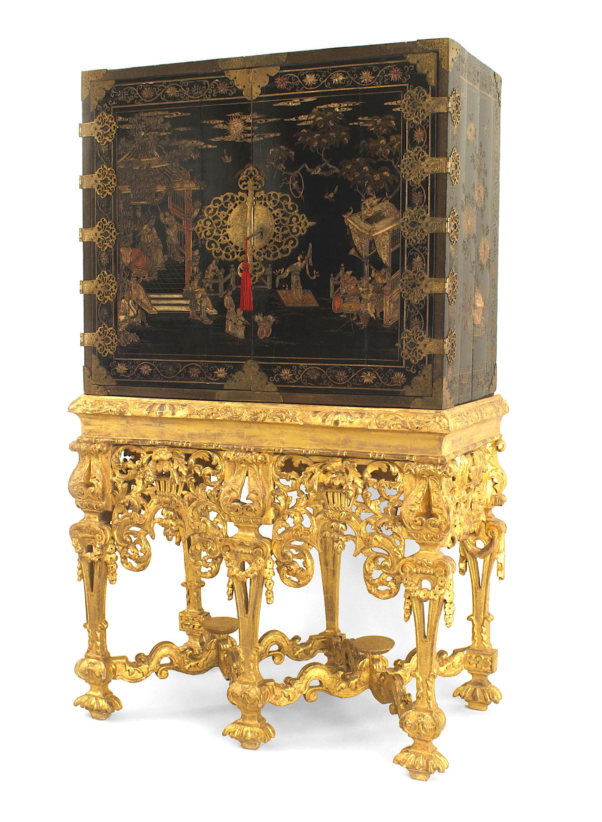 Asian Chinese coromandel lacquer cabinet on an English Charles II gilt-wood Stand (c. 1685) with doors decorated with court scenes & pierced metal foliate engraved hinges & lock plates and 11 interior decorated drawers

Provenance: The 2nd Viscount