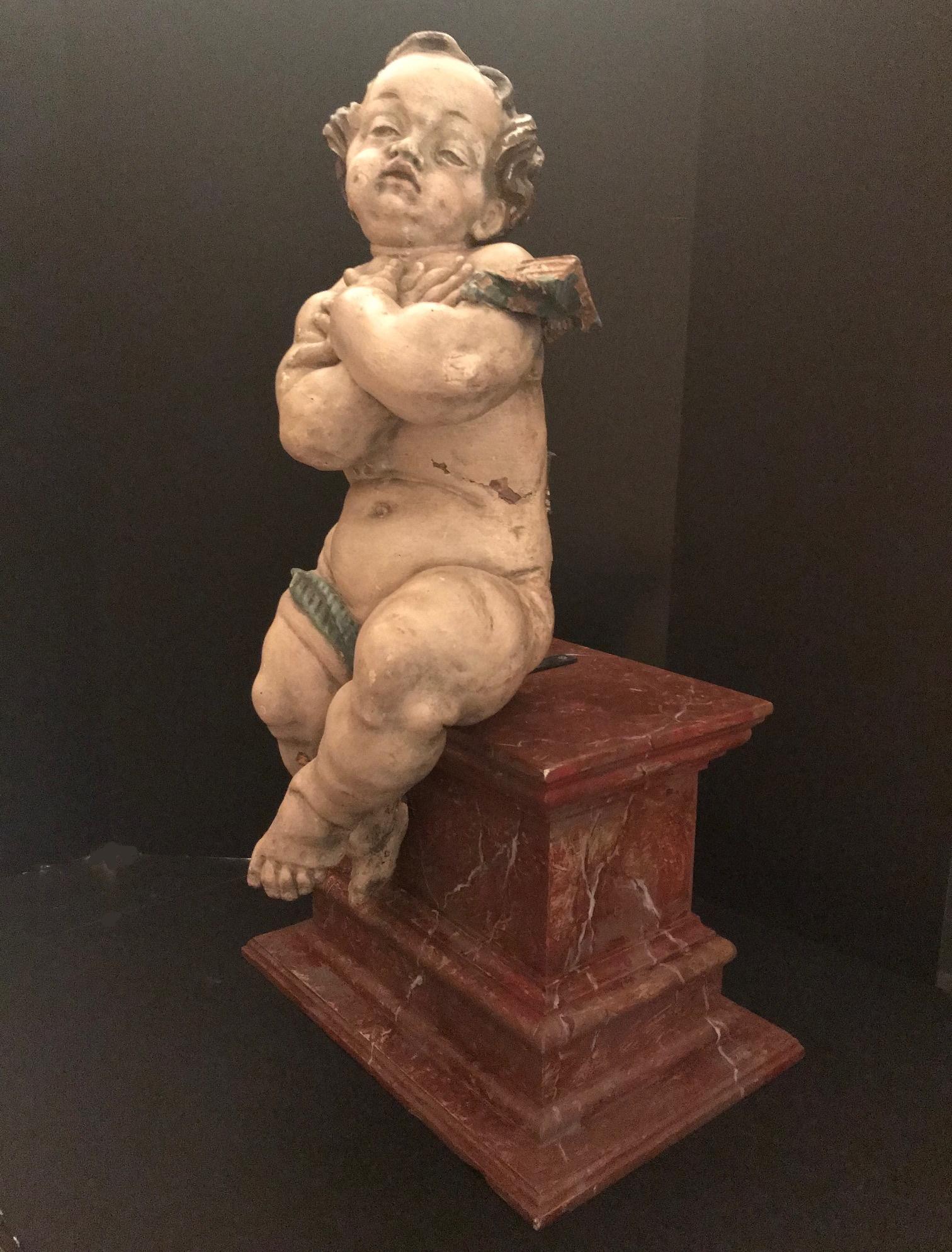 German Baroque Wood Carved Life Sized Putto, Original Polychrome #1 of 2 In Good Condition In Vero Beach, FL