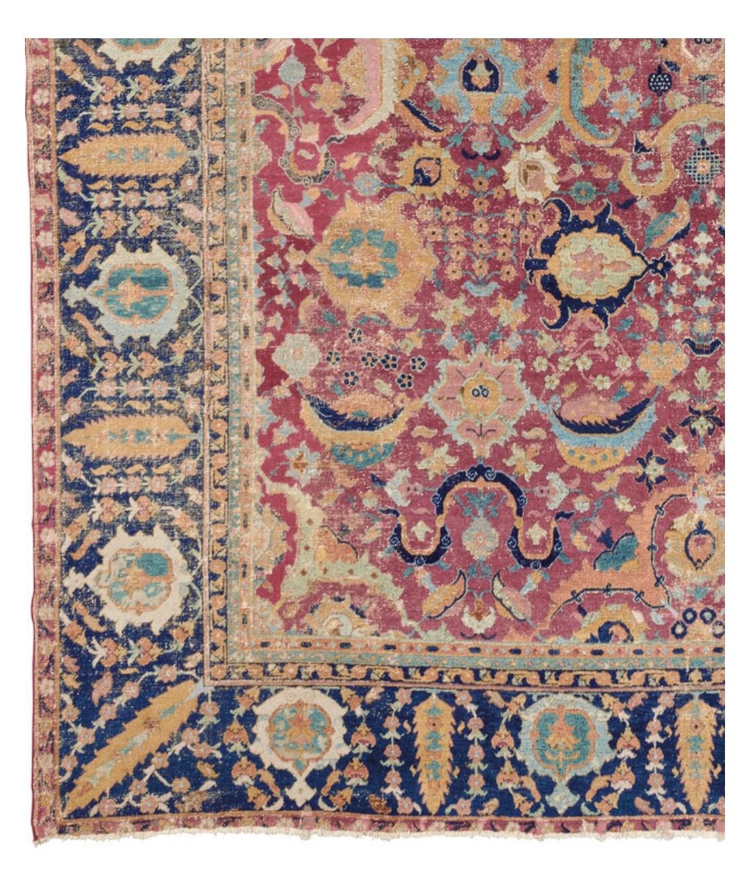 17th C Isfahan carpet
Natural corrosion to crimson and dark brown, with associated extensive repiling, localised repairs, selvages rebound.